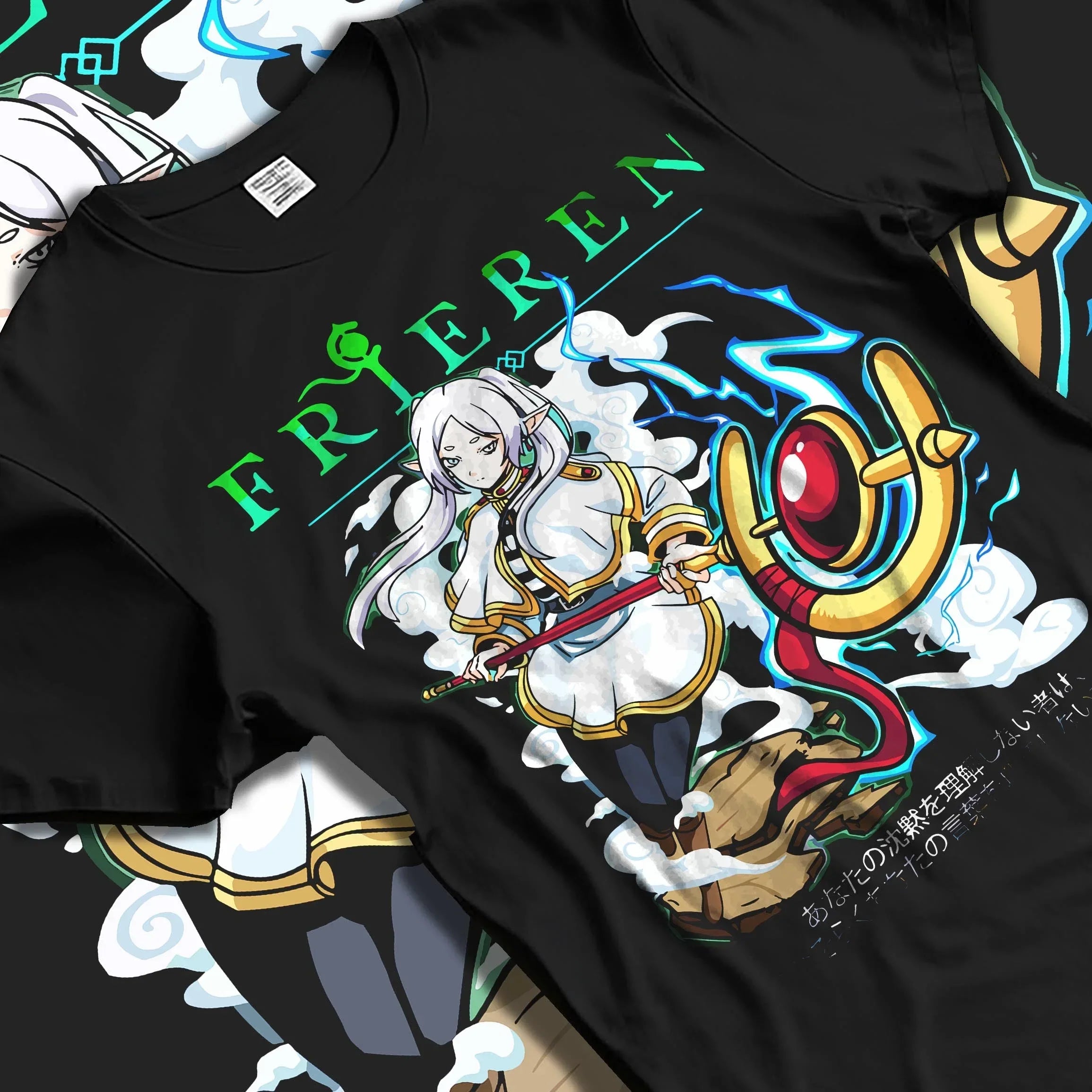 Black T-shirt laid flat featuring Frieren: Beyond Journey’s End anime graphic of Frieren with staff, magical aura, and bold fantasy text.