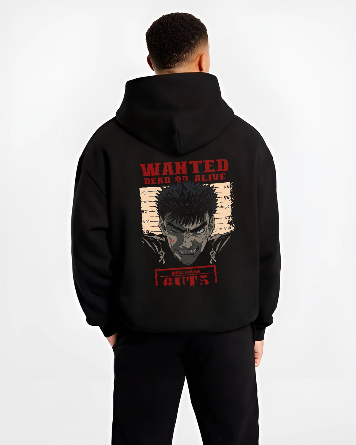 Black hoodie worn by a male model, back view, featuring Berserk retro manga graphic of Guts in wanted dead or alive poster style with bold red highlights.