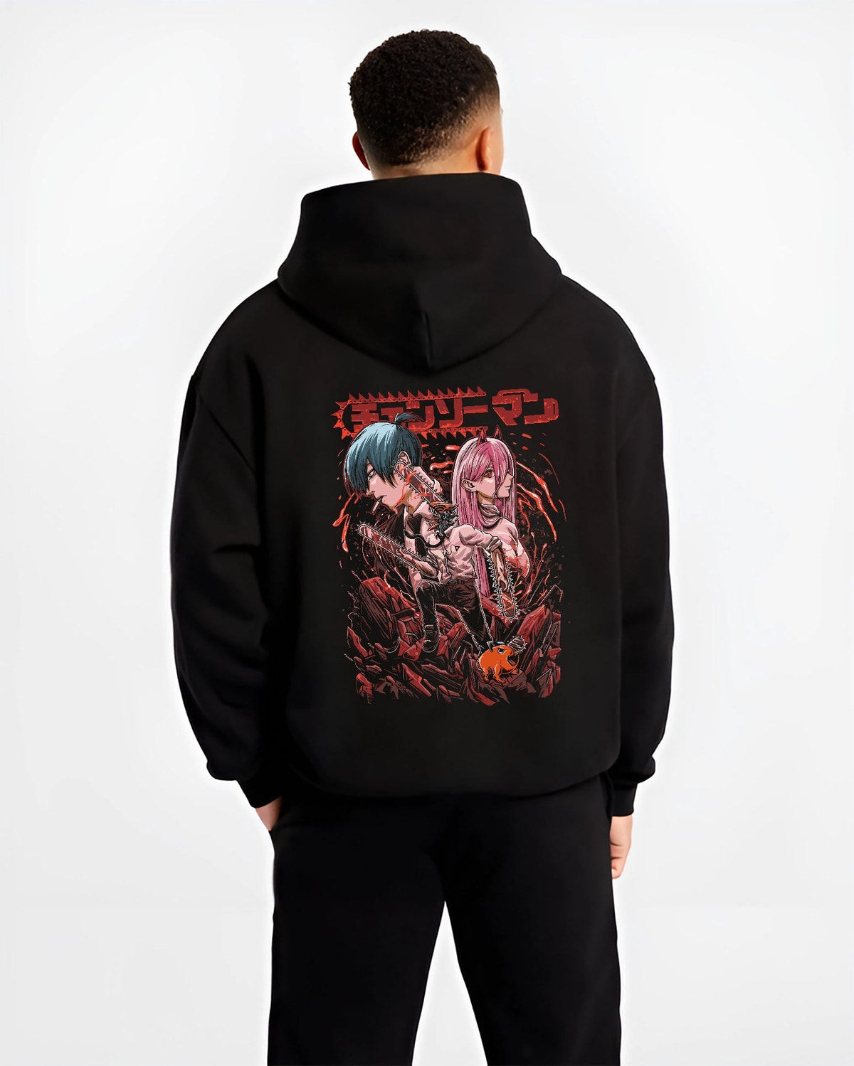 Black hoodie worn by a male model, back view, featuring Chainsaw Man characters Power and Aki in gritty anime poster inspired design with red horror manga aesthetic.