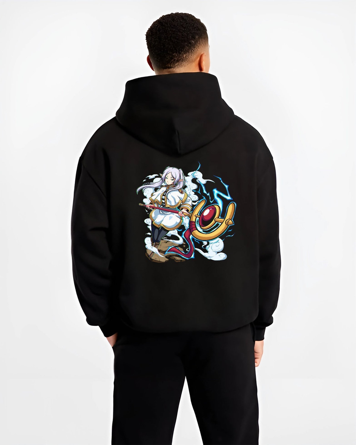 Black hoodie worn by a male model, back view, featuring Black Clover Mereoleona Japanese animation streetwear design with bold lightning and detailed manga artwork.