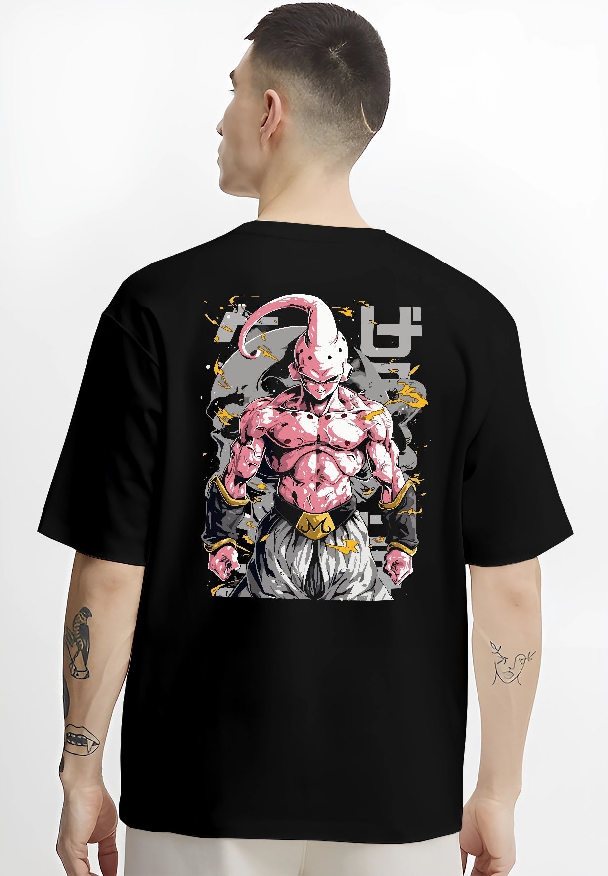 Black T-shirt worn by a male model, back view, featuring Dragon Ball Majin Buu anime poster inspired design in shonen battle pose with retro manga graphic style.