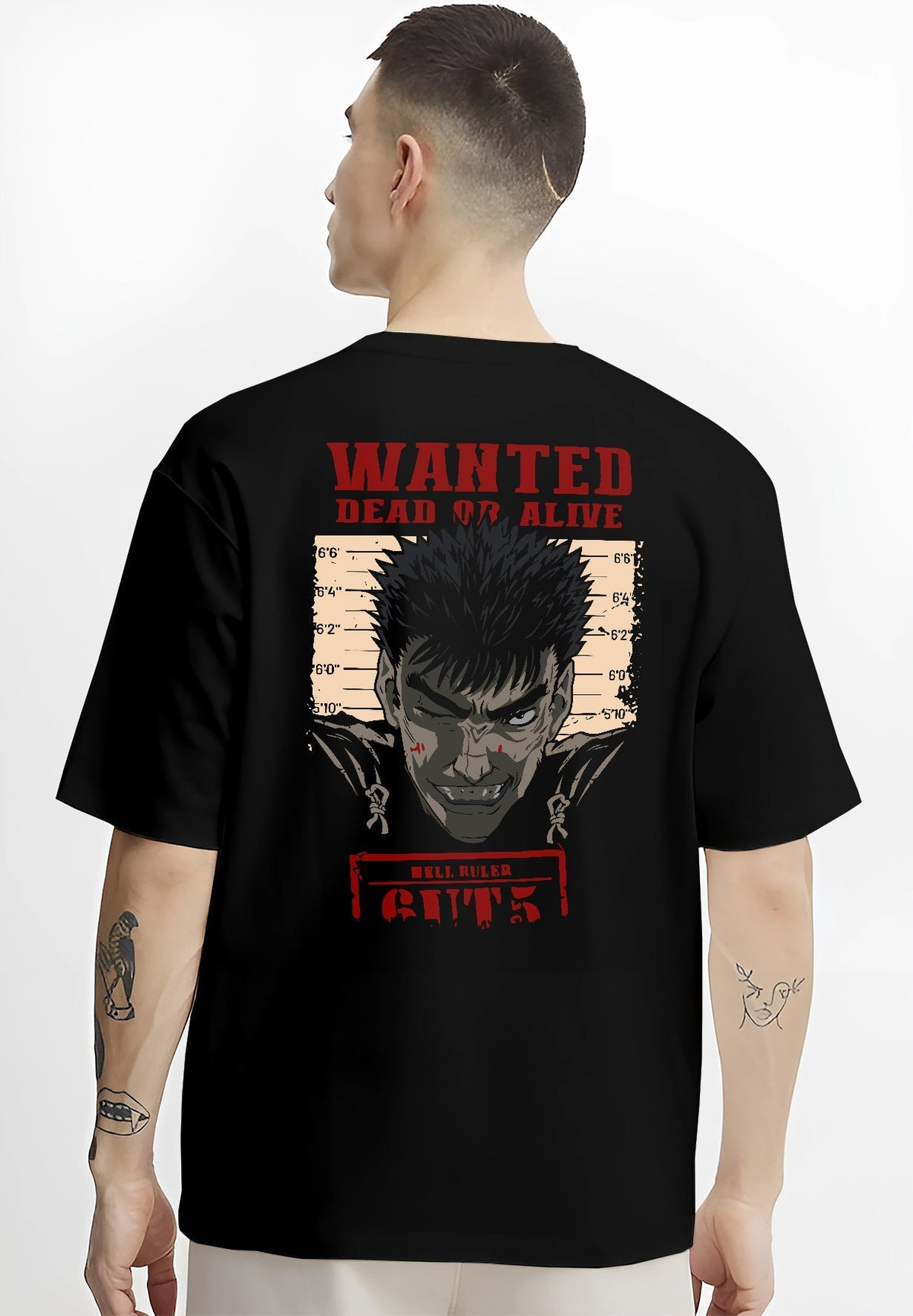 Black T-shirt worn by a male model, back view, featuring Berserk retro manga wanted poster of Guts with dark anime streetwear style and bold red text.
