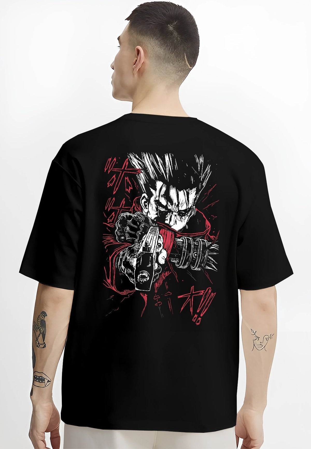 Black hoodie worn by a female model, back view, featuring Vash the Stampede retro manga graphic design with striking red coat and detailed weapon artwork.