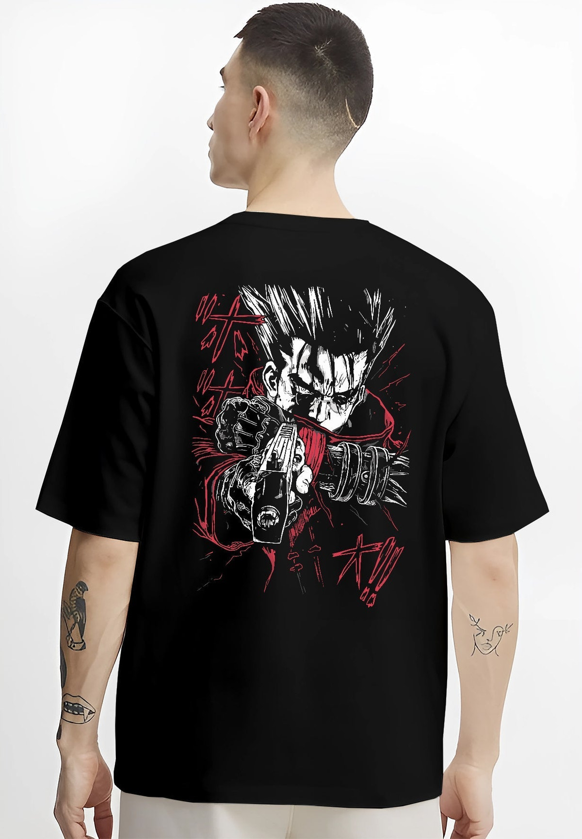 Black hoodie worn by a female model, back view, featuring Vash the Stampede retro manga graphic design with striking red coat and detailed weapon artwork.