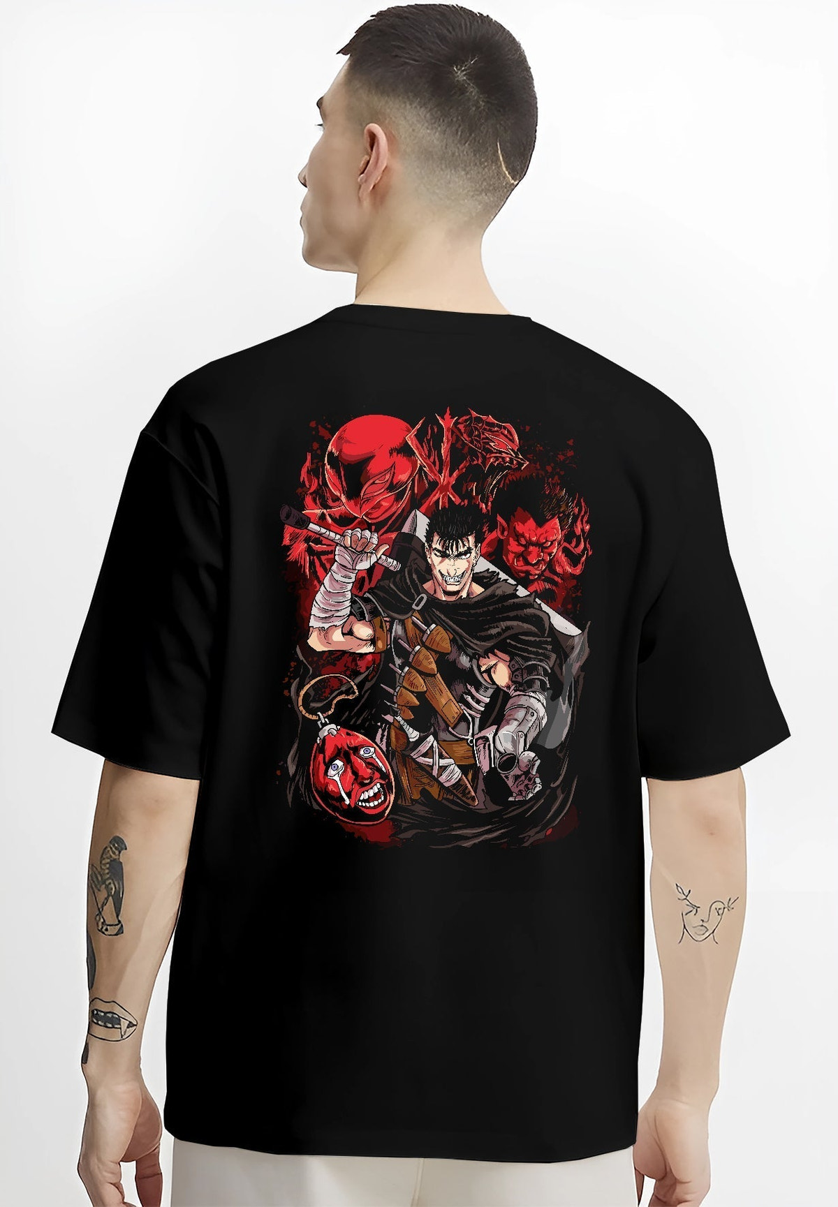 Black T-shirt worn by a male model, back view, featuring Berserk Guts anime poster inspired artwork with Apostles, shonen battle character in crimson style.