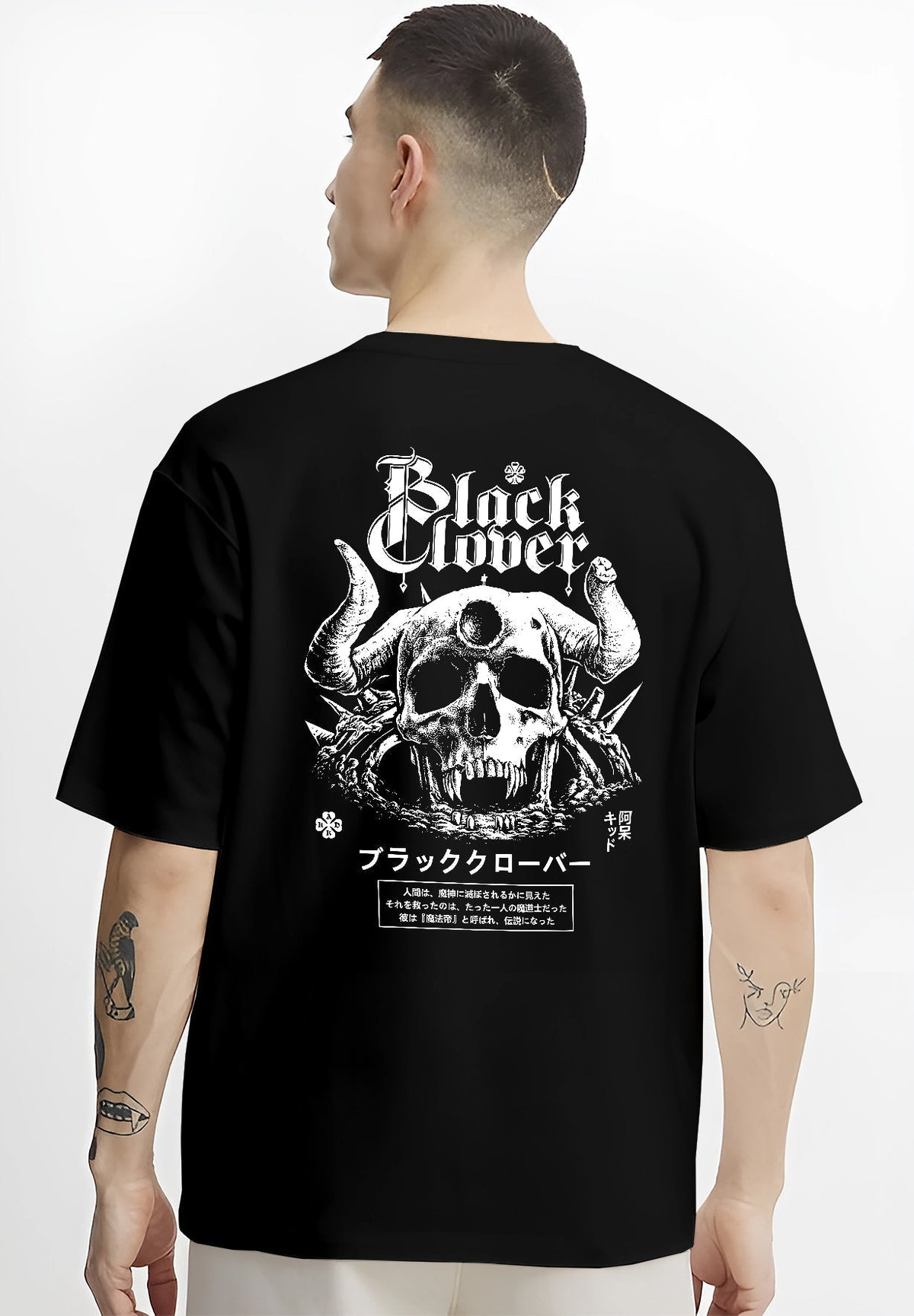 Black T-shirt worn by a male model, back view, featuring Black Clover retro manga graphic skull artwork with dark Japanese animation streetwear style.