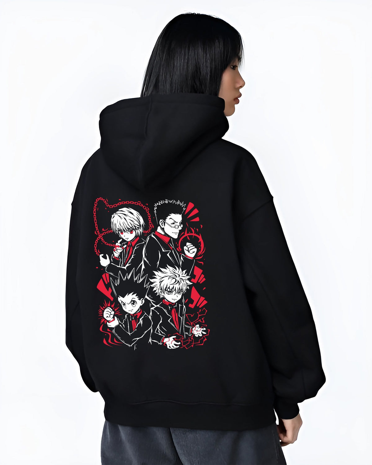 Black hoodie worn by a female model, back view, featuring Hunter x Hunter anime poster inspired Gon, Killua, Kurapika, and Leorio group portrait with red retro manga accents.