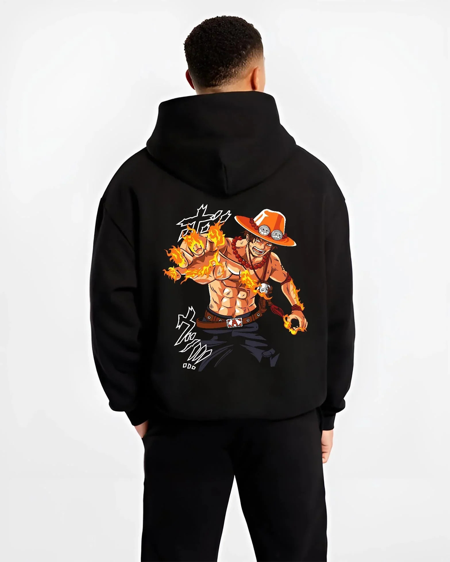 Black hoodie worn by male model, back view with Portgas Ace Blaze Hoodie One Piece Ember Aura Flames graphic streetwear graphic.