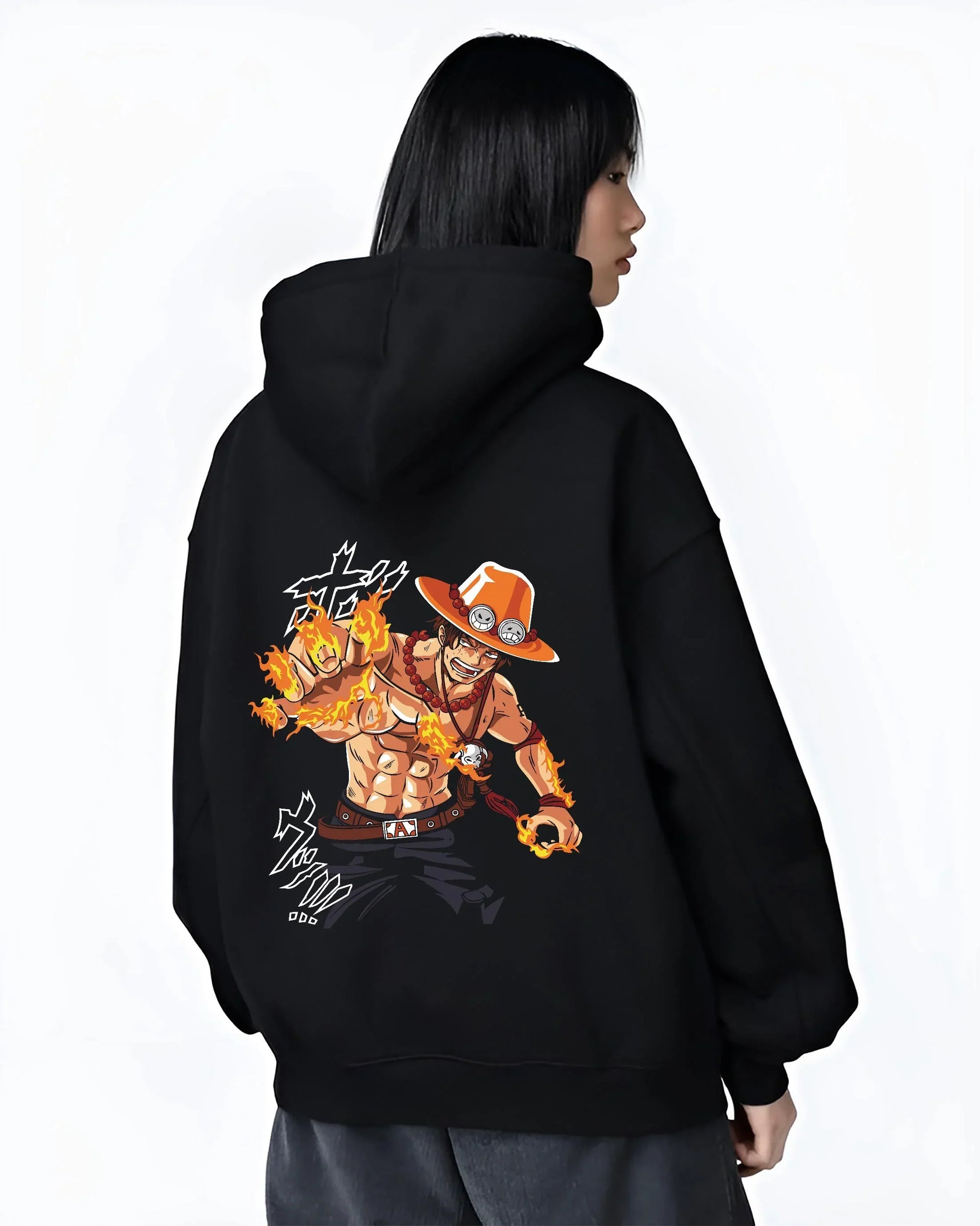 Black hoodie worn by female model, back view with Portgas Ace Blaze Hoodie One Piece Ember Aura Flames graphic streetwear graphic.