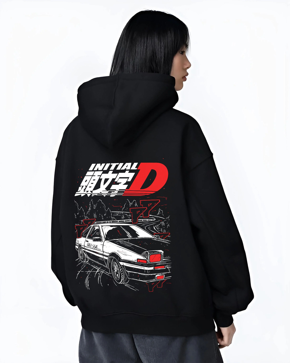 Black hoodie worn by female model from the back featuring Takumi Fujiwara AE86 Initial D drift racing artwork.