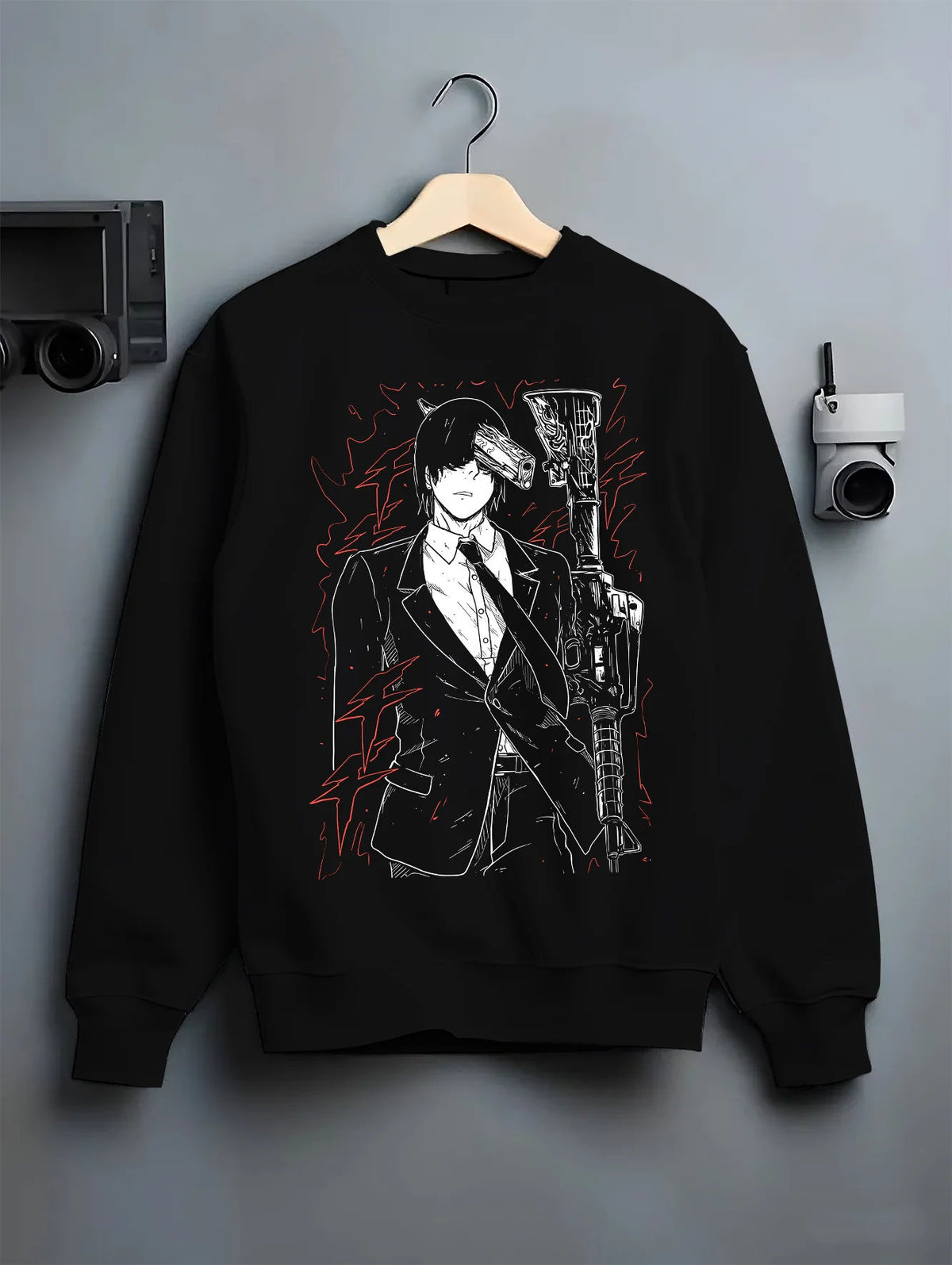 Black crewneck sweatshirt on hanger showing Aki Hayakawa from Chainsaw Man: portrait with weapons