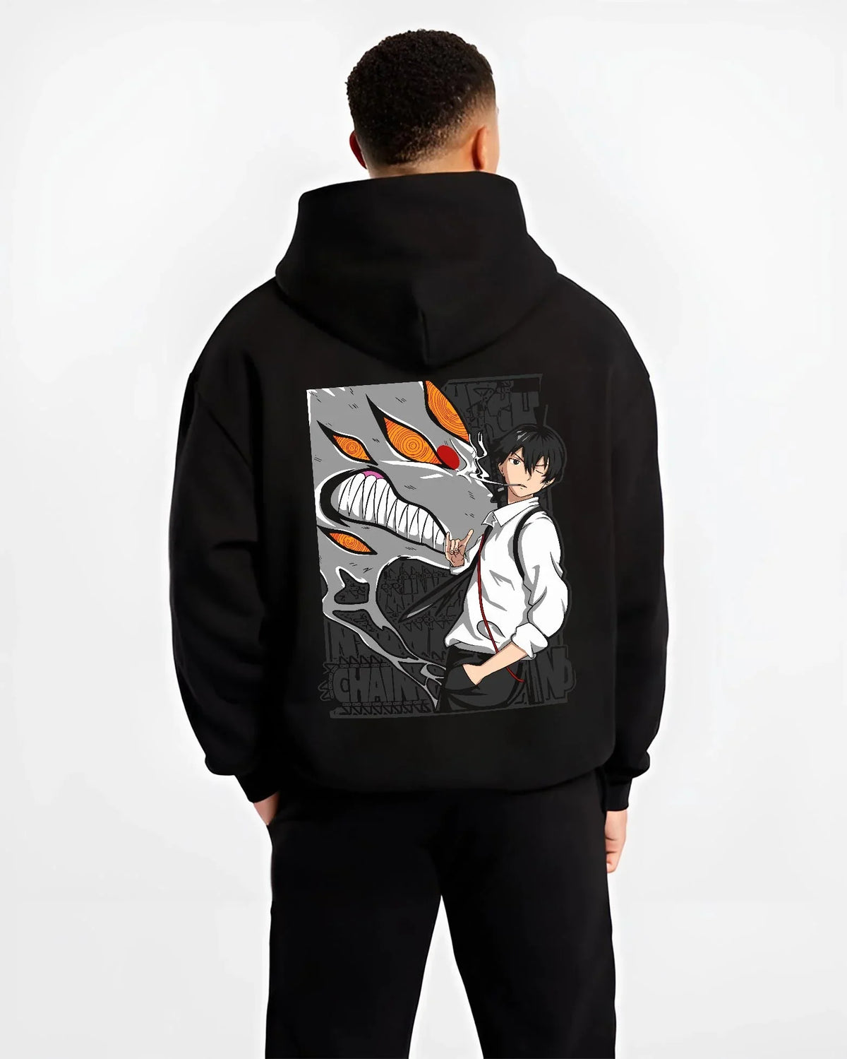 Black hoodie worn by male model, back view with Chainsaw Man Hoodie Denji Devil Hunter Chainsaw Blades graphic premium wear.