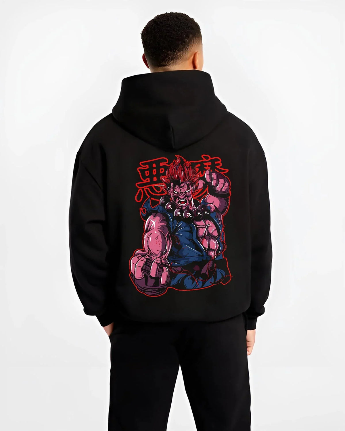 Black hoodie worn by male model, back view with Akuma Raging Demon Hoodie Street Fighter Dark Energy graphic Akuma anime design.