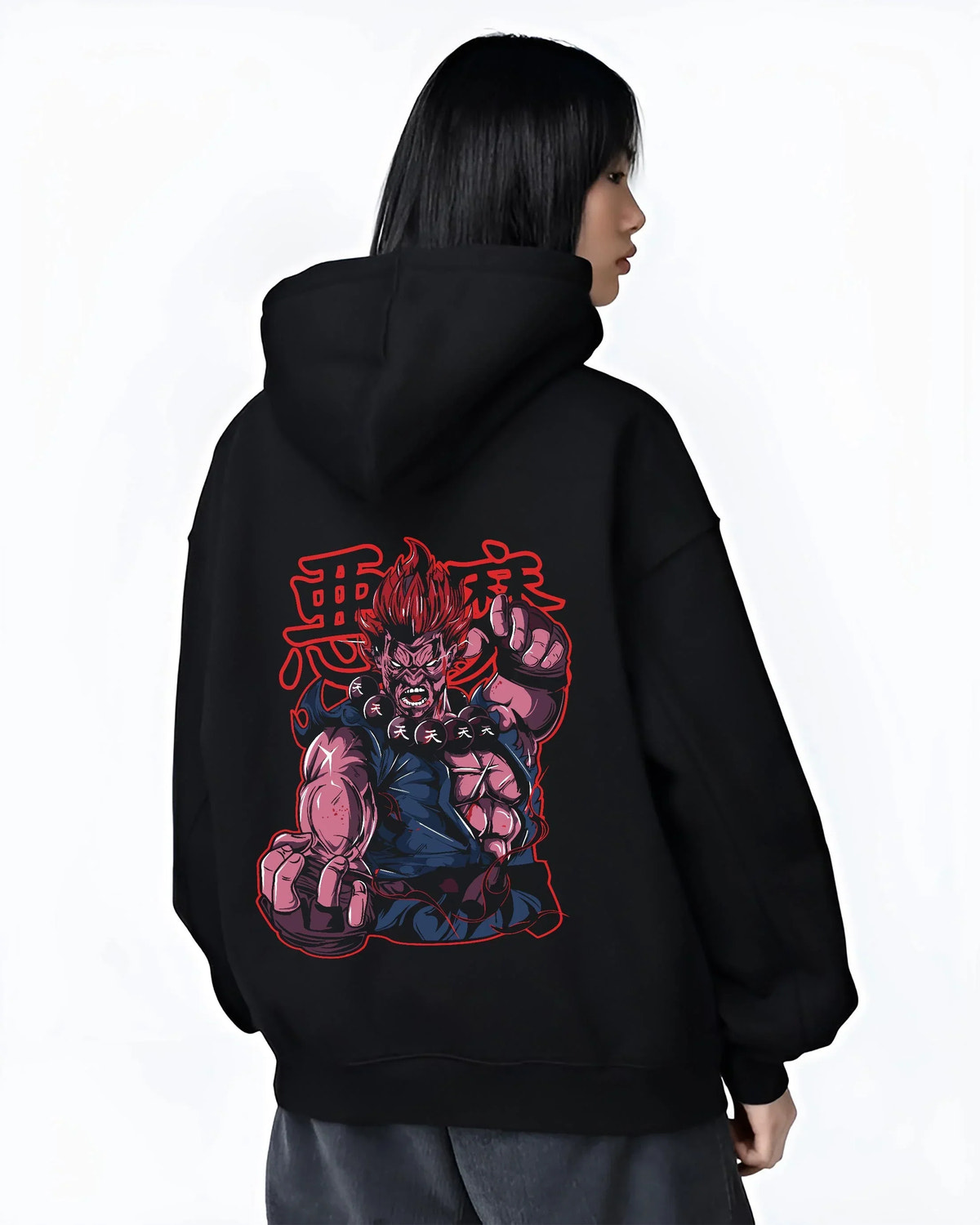 Black hoodie worn by female model, back view with Akuma Raging Demon Hoodie Street Fighter Dark Energy graphic Akuma anime design.