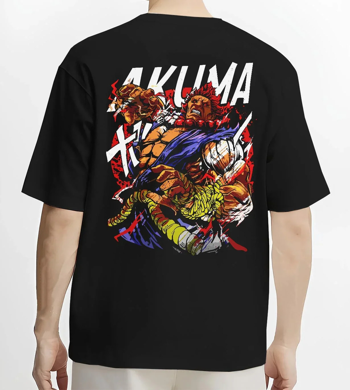 Black T-shirt worn by male model, back view with Akuma Max Power Hoodie Street Fighter Fiery Demon Aura graphic Akuma anime design.