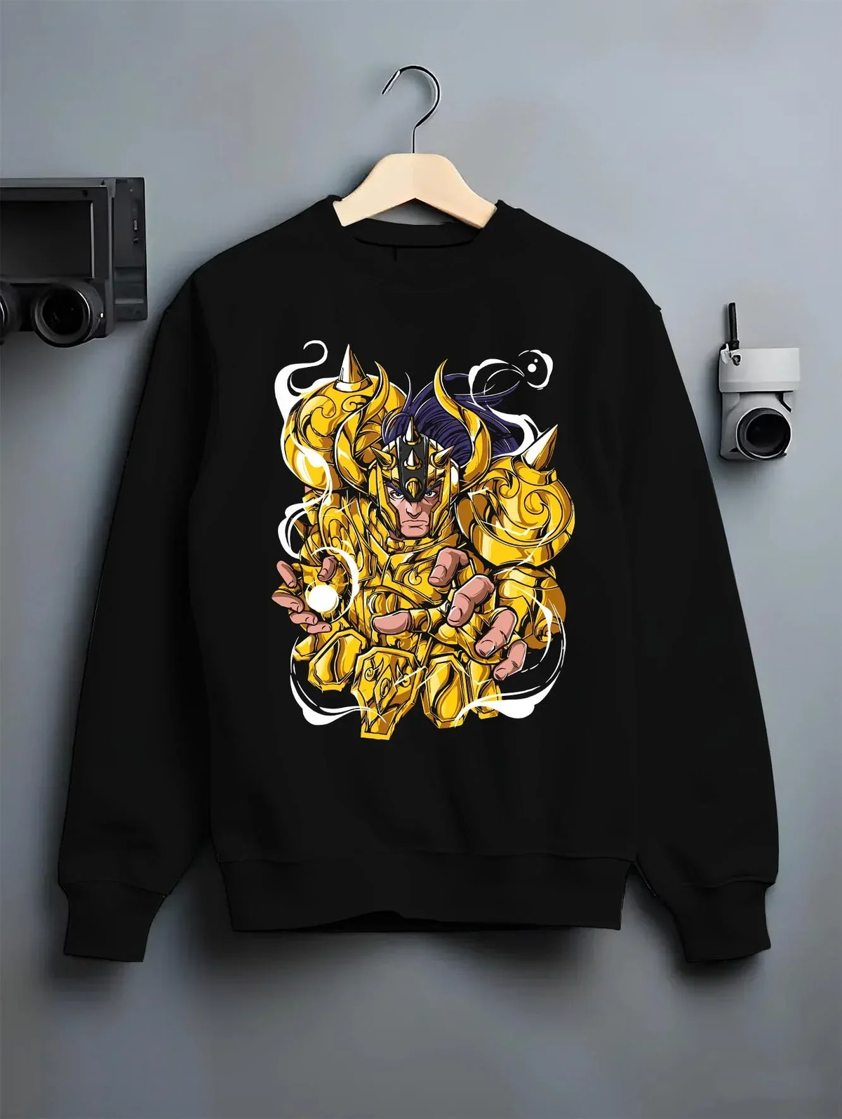 Black crewneck sweatshirt on hanger with Aldebaran Gold Saint Hoodie Saint Seiya Taurus Power graphic streetwear graphic.