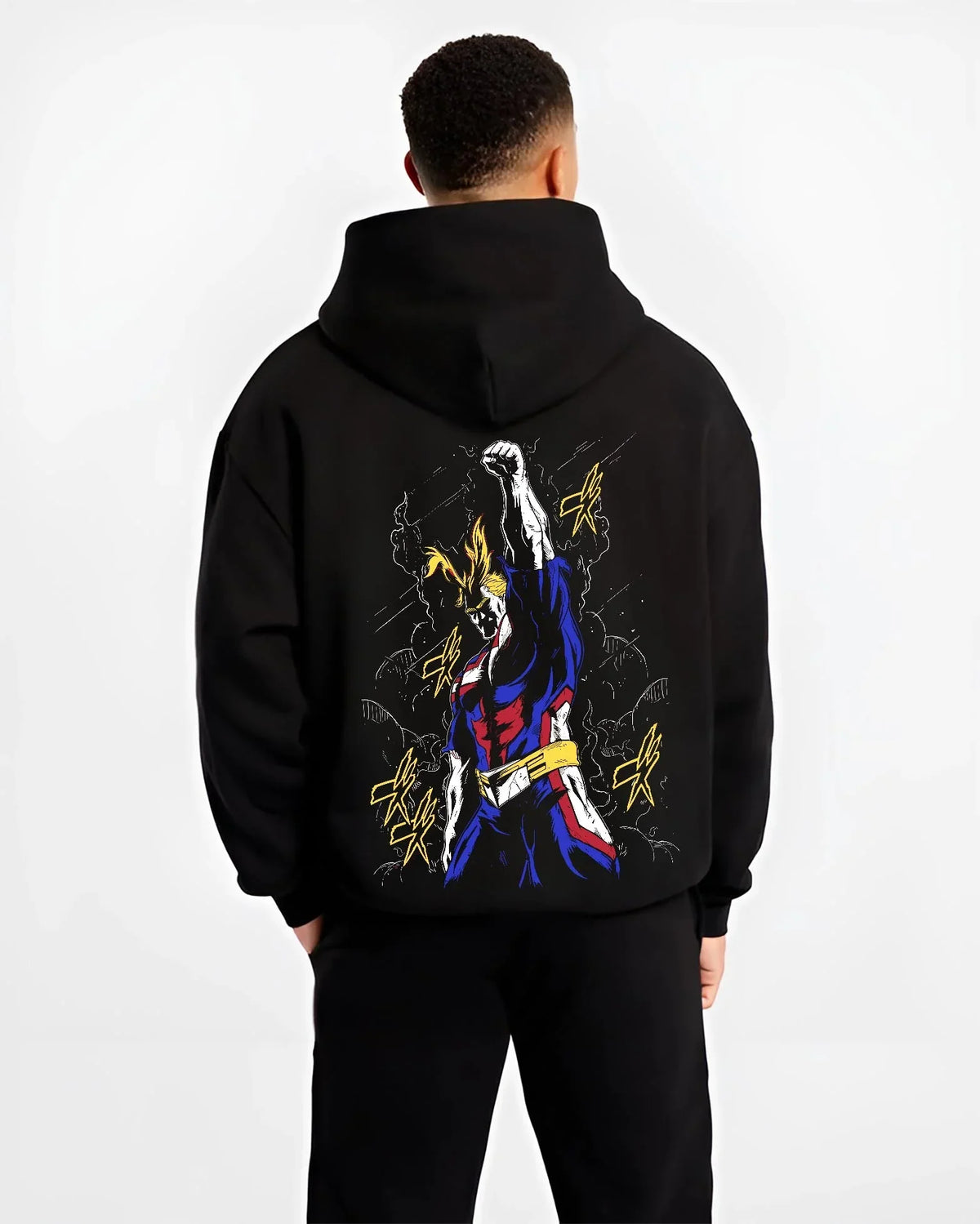 Black hoodie worn by male model, back view with All Might Power Hoodie My Hero Academia Lightning Pose graphic bold anime graphic.