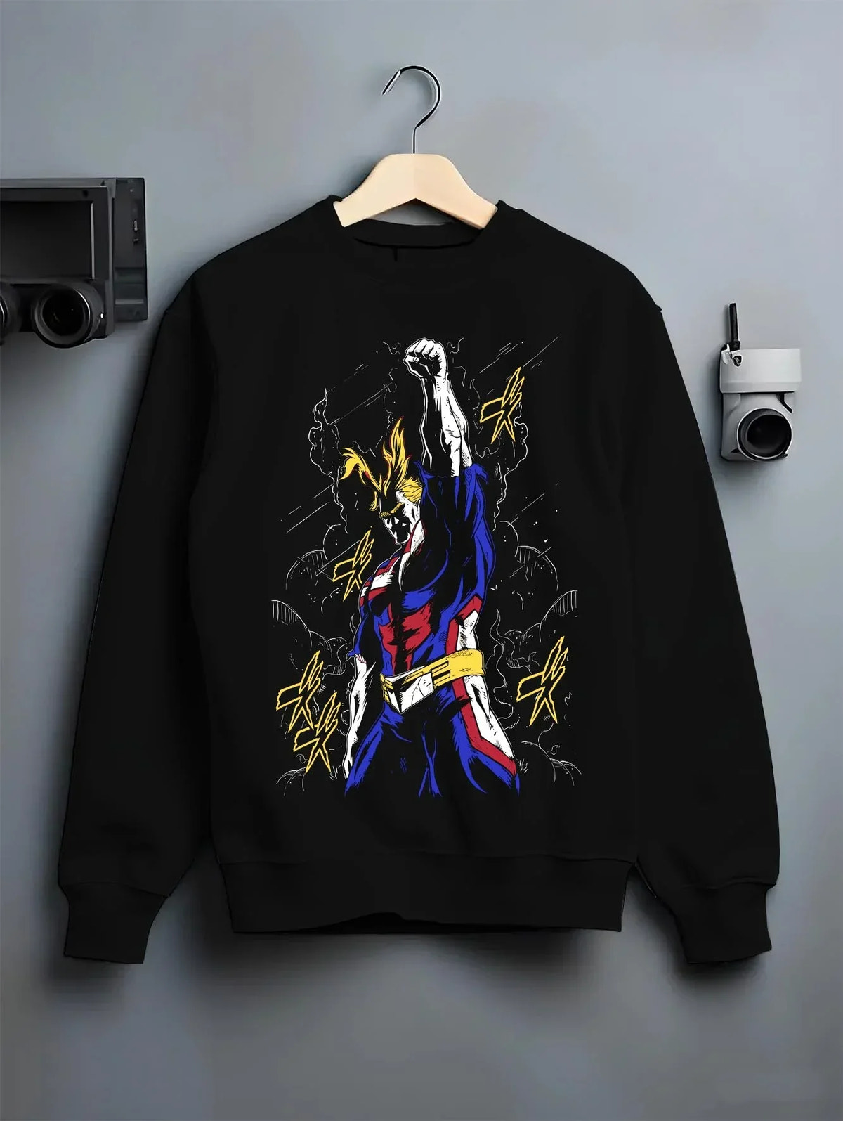 Black crewneck sweatshirt on hanger with All Might Power Hoodie My Hero Academia Lightning Pose graphic bold anime graphic.