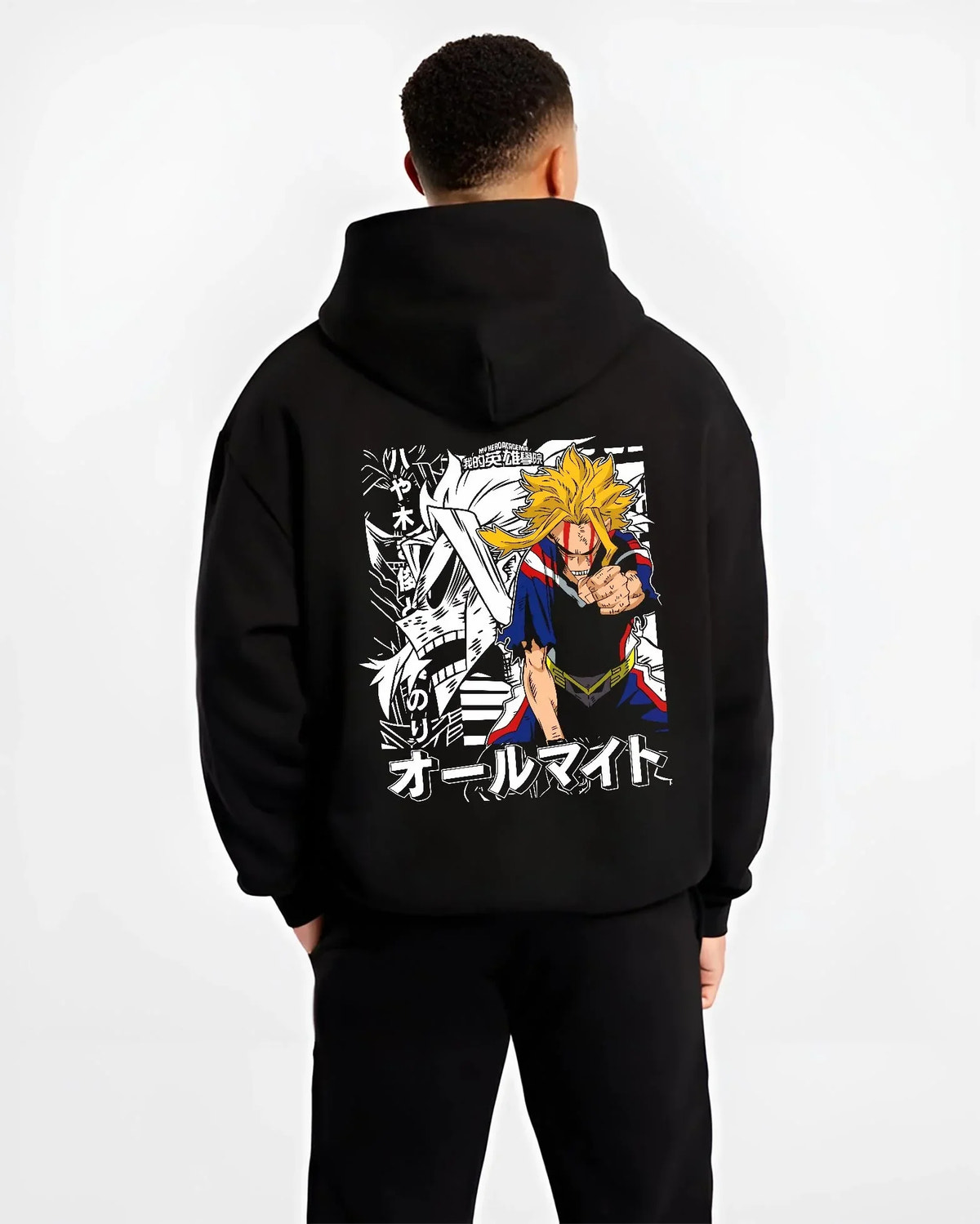 Black hoodie worn by male model, back view with All Might Crossover Hoodie Dragon Ball Z x Hero Fusion graphic premium wear.