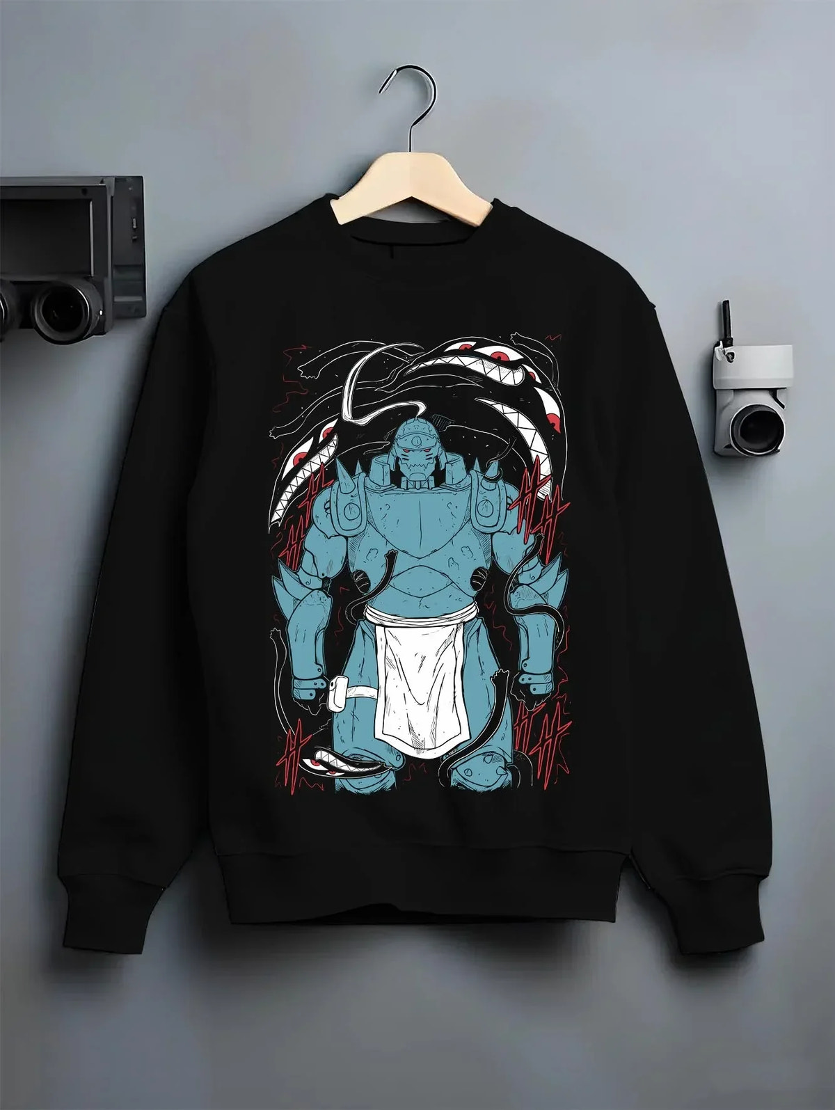 Black crewneck sweatshirt on hanger with Alphonse Hoodie Fullmetal Alchemist Steel Armoured Form graphic streetwear graphic.