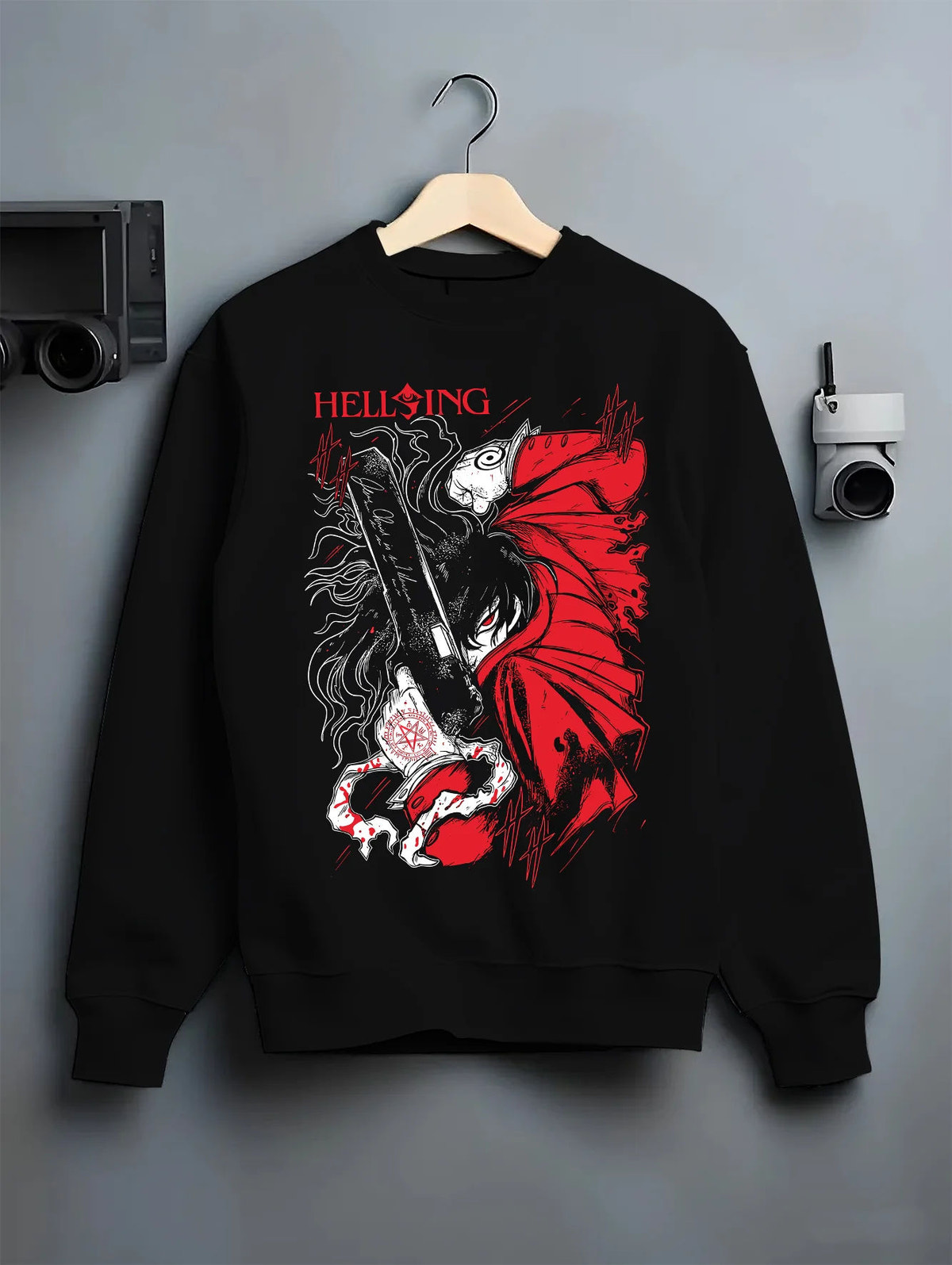 Black crewneck sweatshirt on hanger with Alucard from Hellsing illustrated back graphic