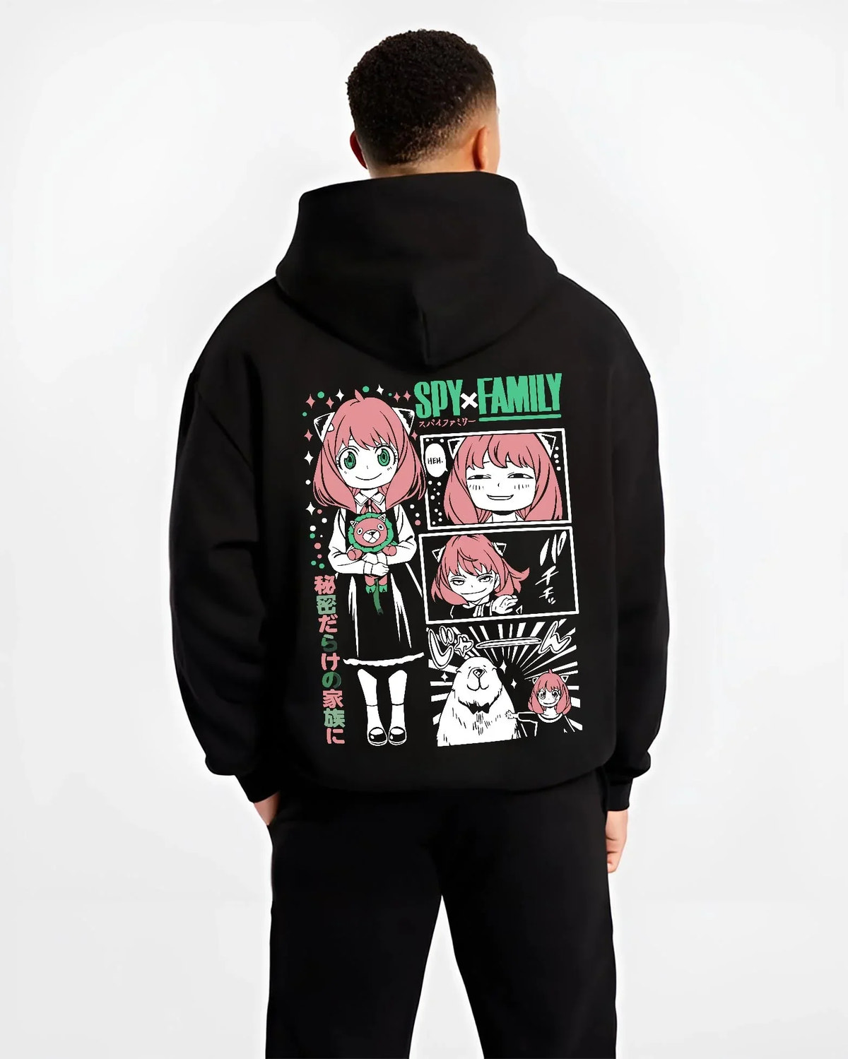 Black hoodie worn by male model, back view with Anya Forger Hoodie Spy x Family Manga Comic Collage graphic streetwear graphic.