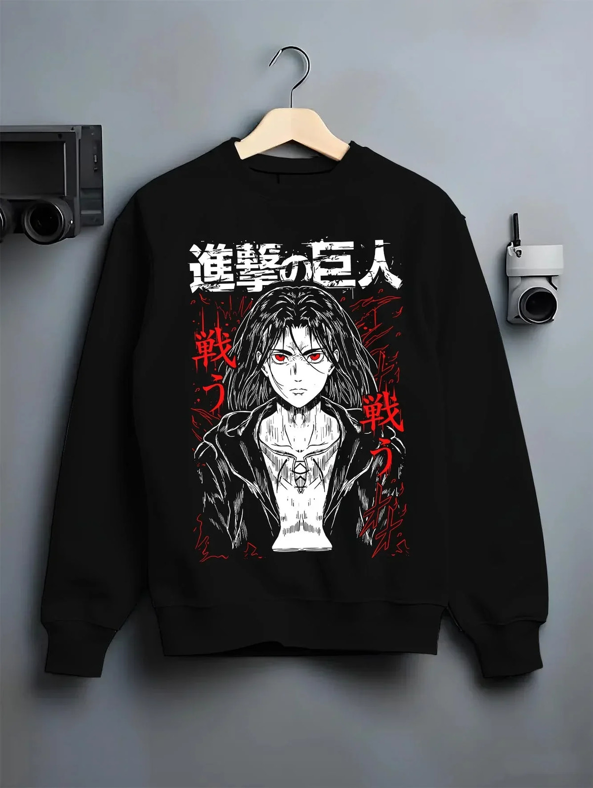 Black crewneck sweatshirt on hanger with Eren Yeager Hoodie Attack on Titan War Cry Panel Print graphic premium wear.