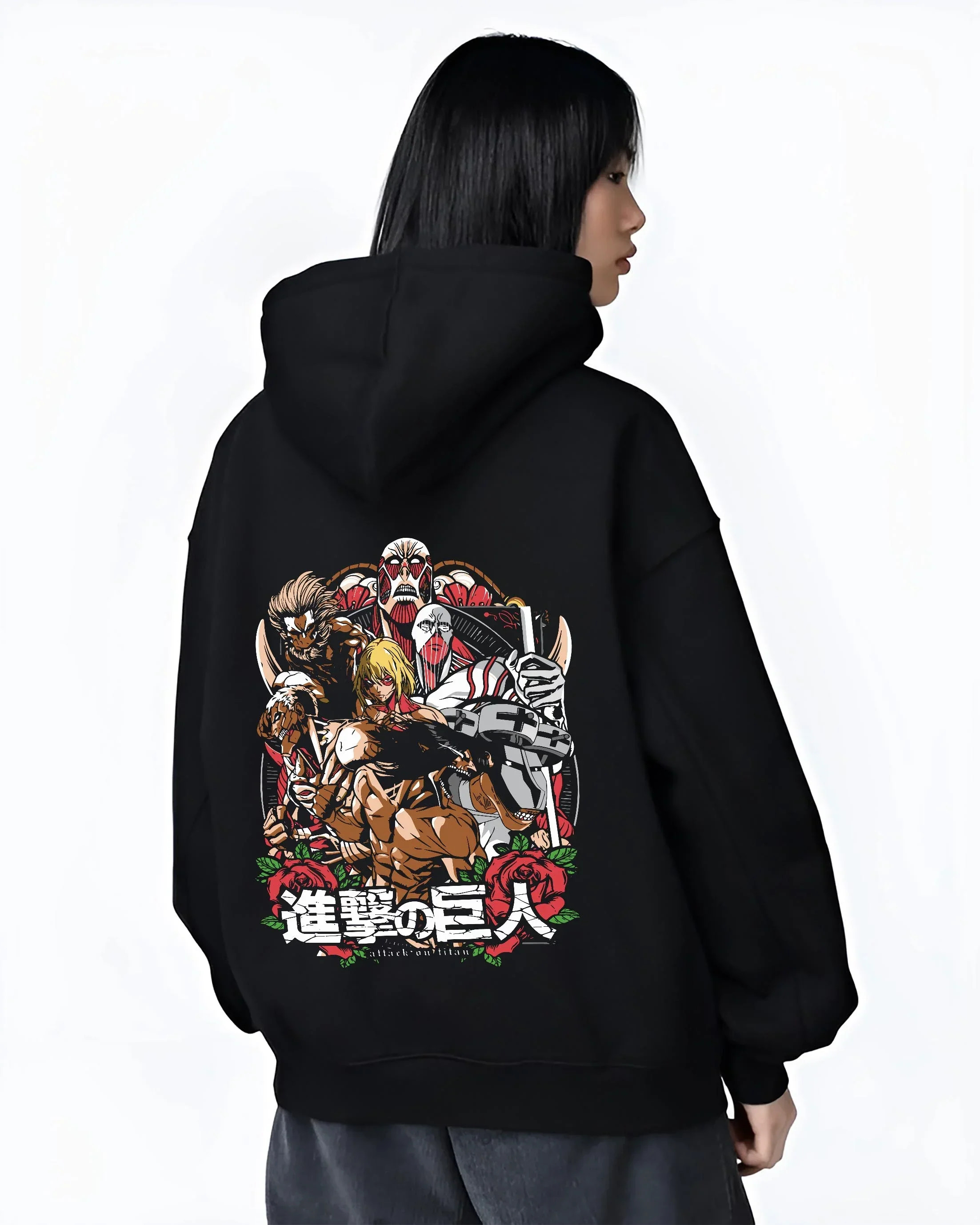 Black hoodie worn by female model, back view with Attack on Titan Hoodie Final Season Battle Manga Panel graphic streetwear graphic.