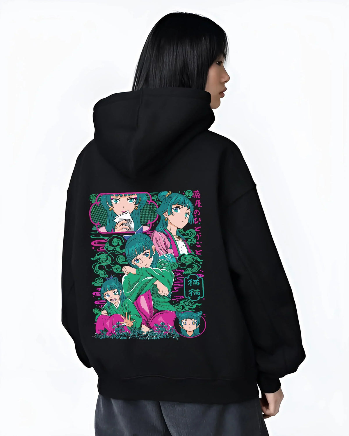 Black hoodie worn by female model, back view with Apothecary Diaries Hoodie Maomao Pink Hair Trio Panel graphic premium wear.