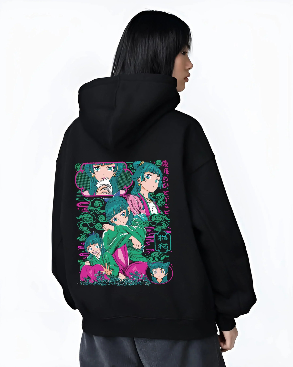 Black hoodie worn by female model, back view with Apothecary Diaries Hoodie Maomao Pink Hair Trio Panel graphic premium wear.