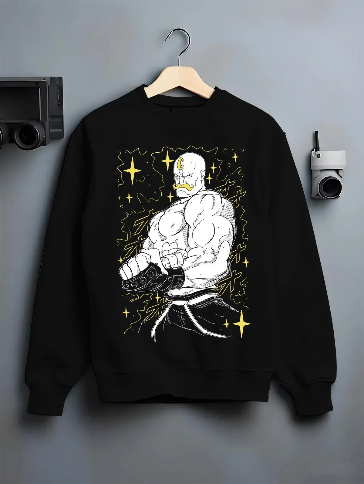 Black crewneck sweatshirt on hanger with Armstrong Hoodie Fullmetal Alchemist Strongman Alchemy graphic bold anime graphic.