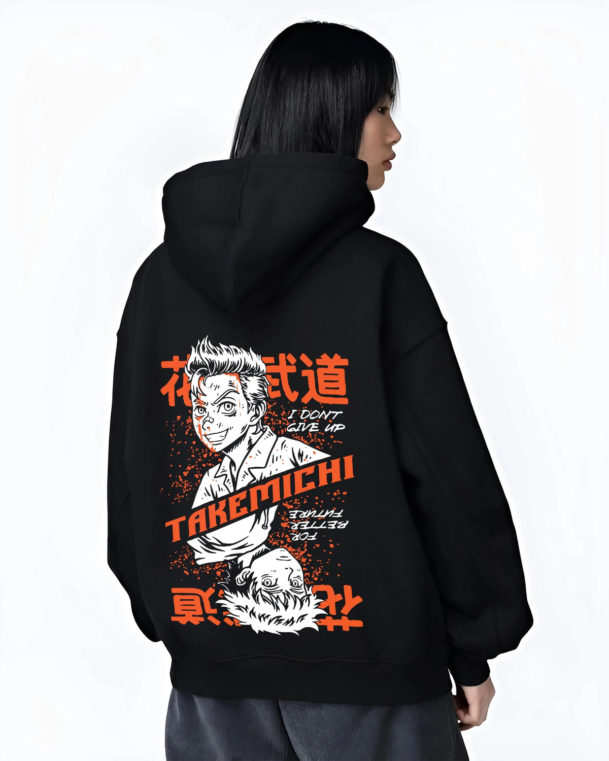 Black hoodie worn by female model from the back featuring Baji Keisuke Tokyo Revengers street manga artwork.