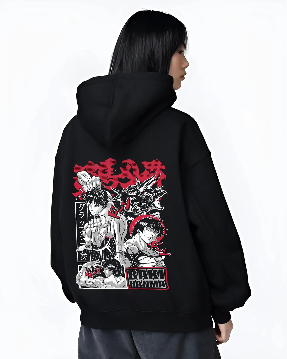Black hoodie worn by female model, back view with Baki vs Bakugo Hoodie Crossover Hero Fighting Poster graphic bold anime graphic.