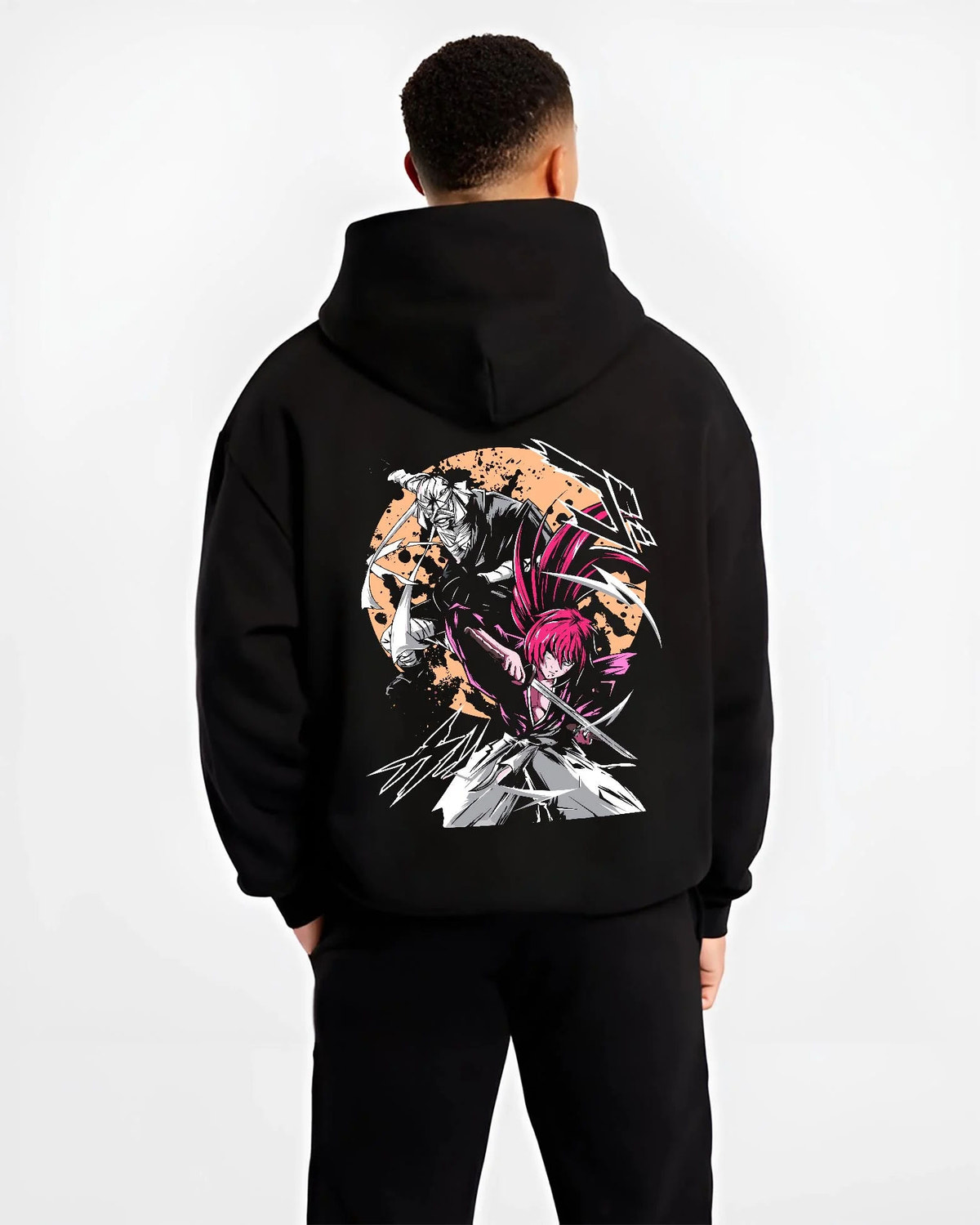 Black hoodie worn by male model from the back featuring Toshiro Hitsugaya Bleach battle slash artwork.