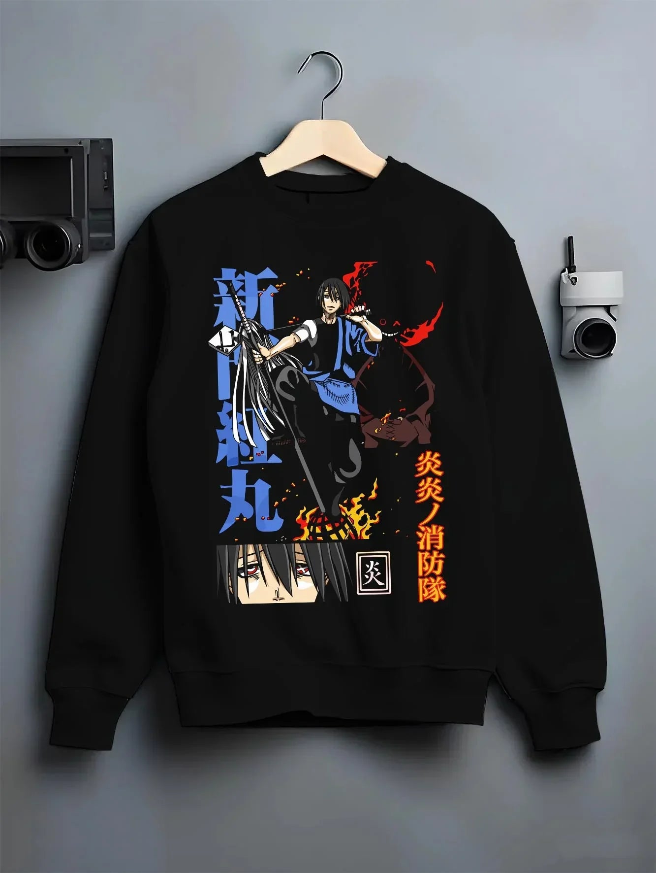 Black crewneck sweatshirt on hanger with Enma Kozato Hoodie Katekyo Hitman Reborn Blue Flames graphic premium wear.