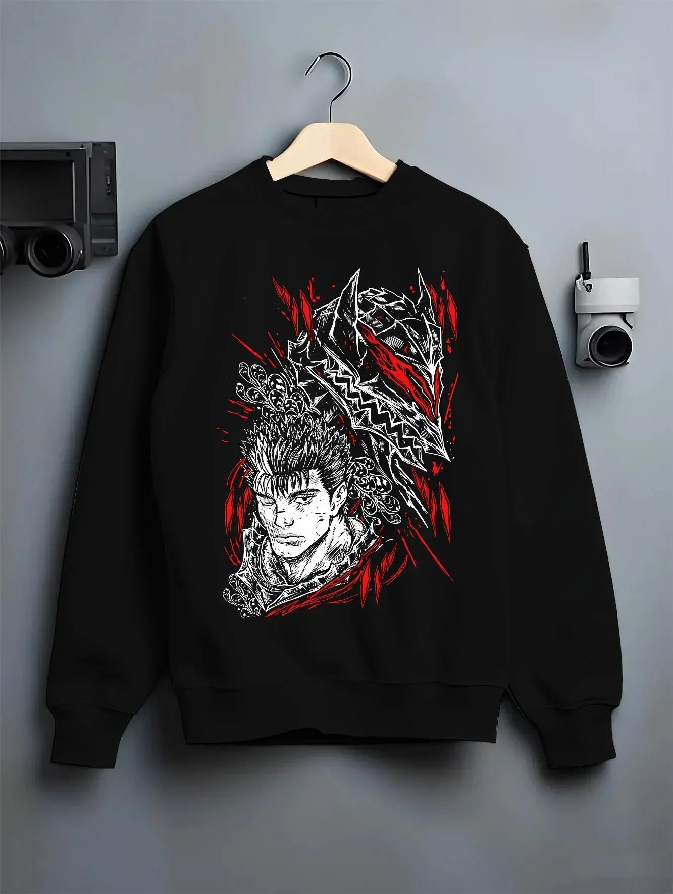 Black crewneck sweatshirt on hanger with Guts Berserk Hoodie Eclipse Skull Knight Dark Battle graphic premium wear.