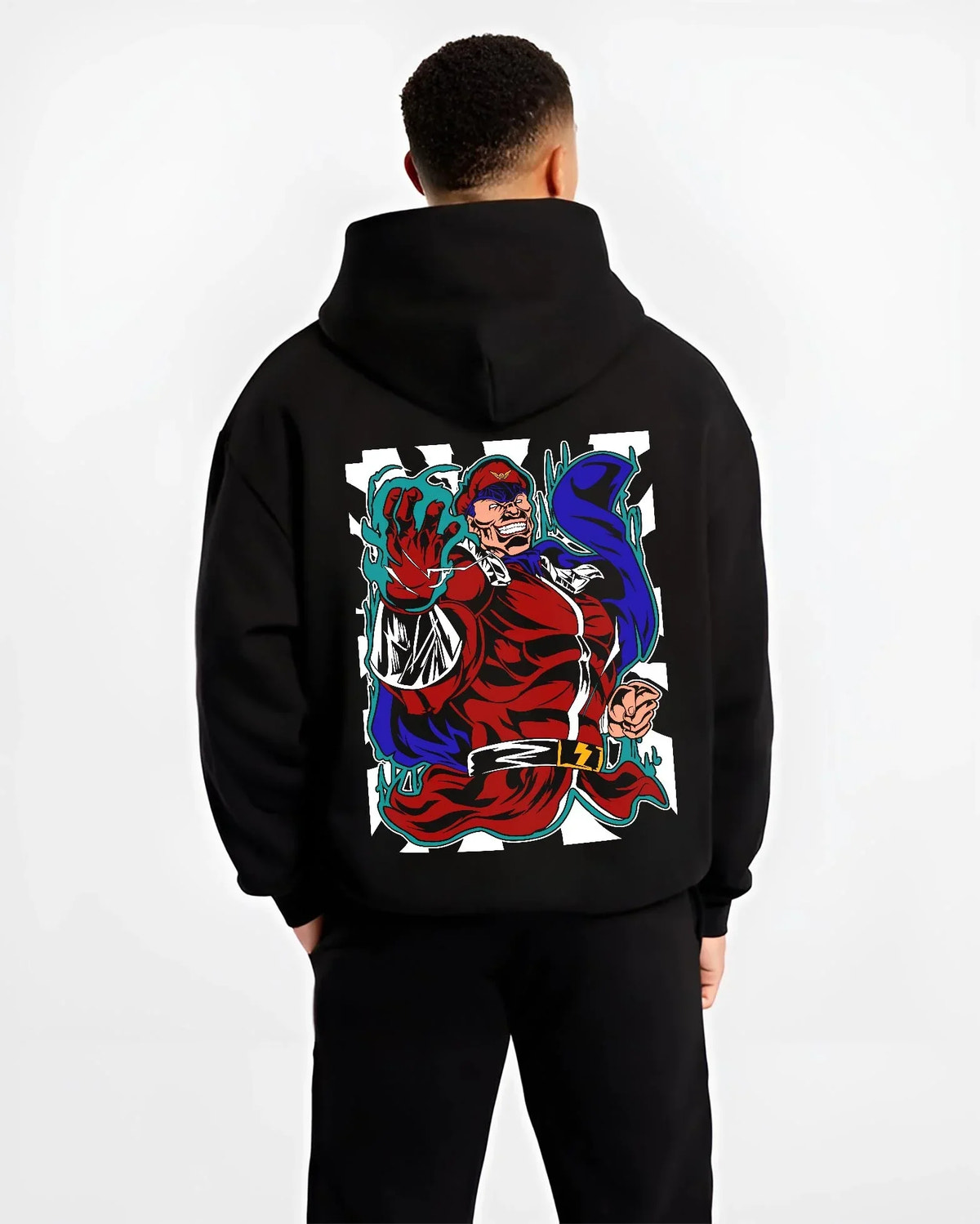 Black hoodie worn by male model, back view with M. Bison Hoodie Street Fighter Psycho Power Pose graphic streetwear graphic.