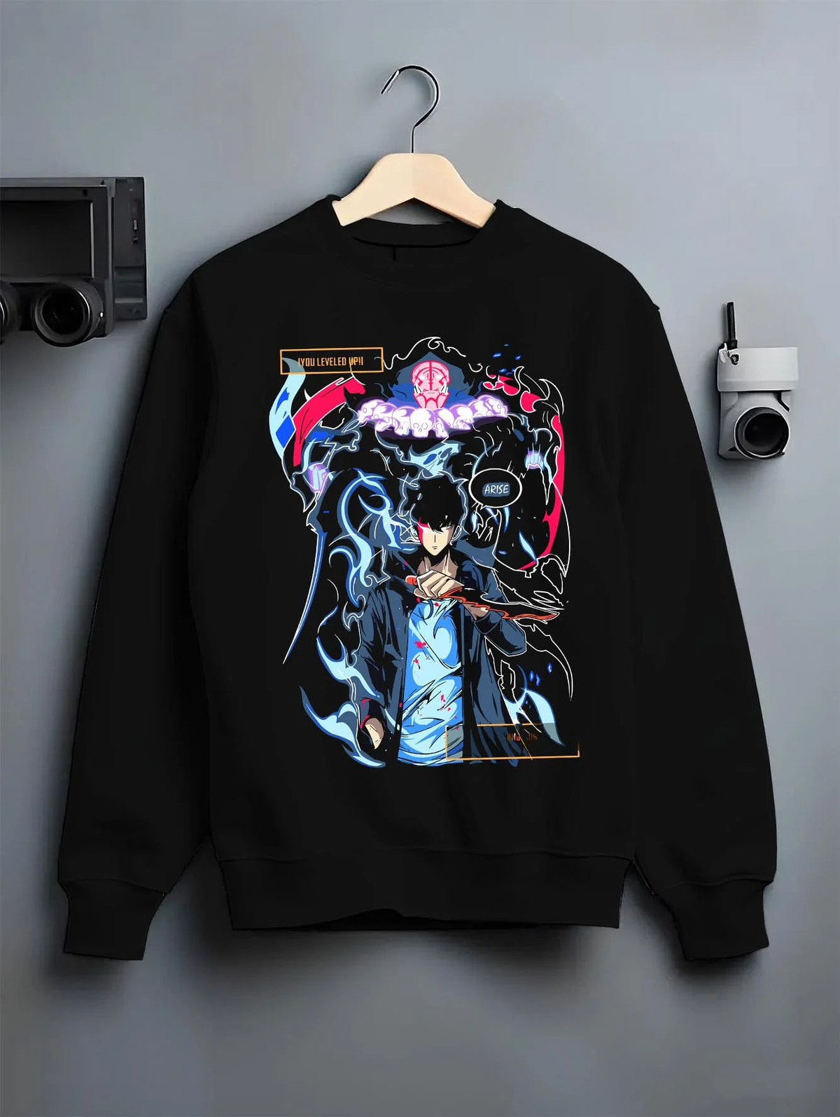 Black crewneck sweatshirt on hanger featuring Rin Okumura Blue Exorcist blue flame artwork.