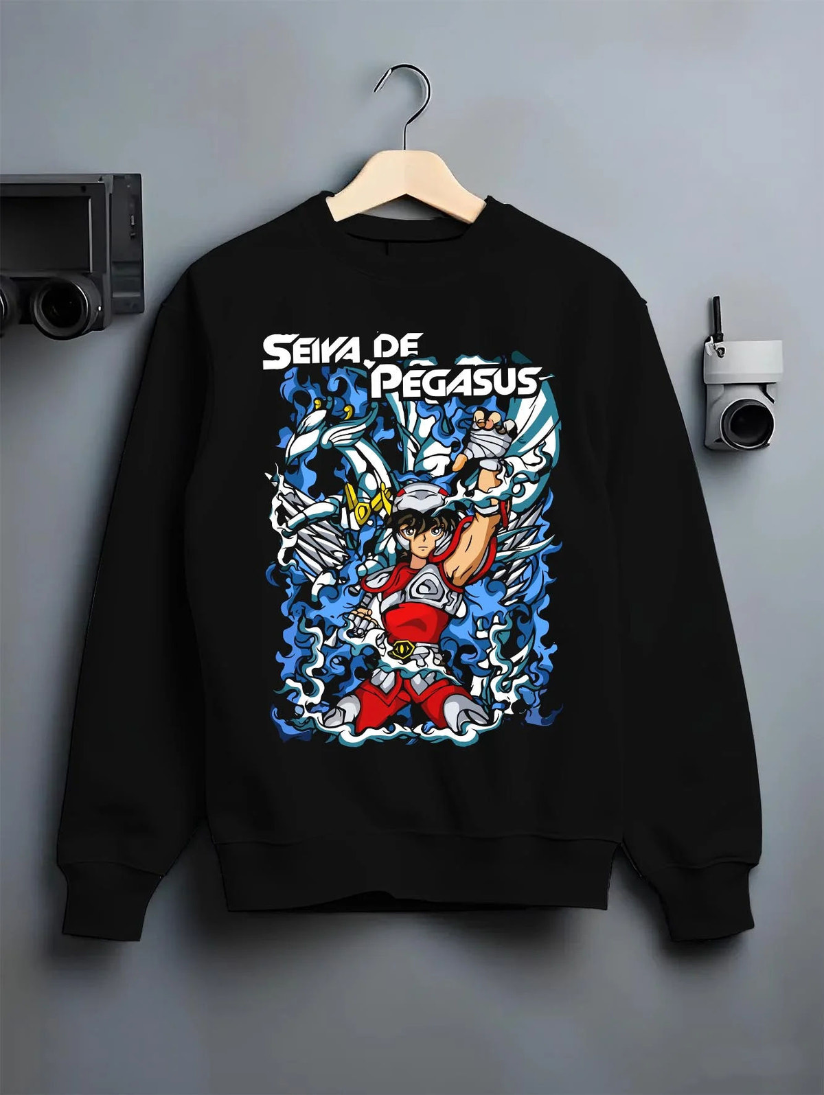 Black crewneck sweatshirt on hanger featuring Pegasus Seiya Saint Seiya blue armour artwork.