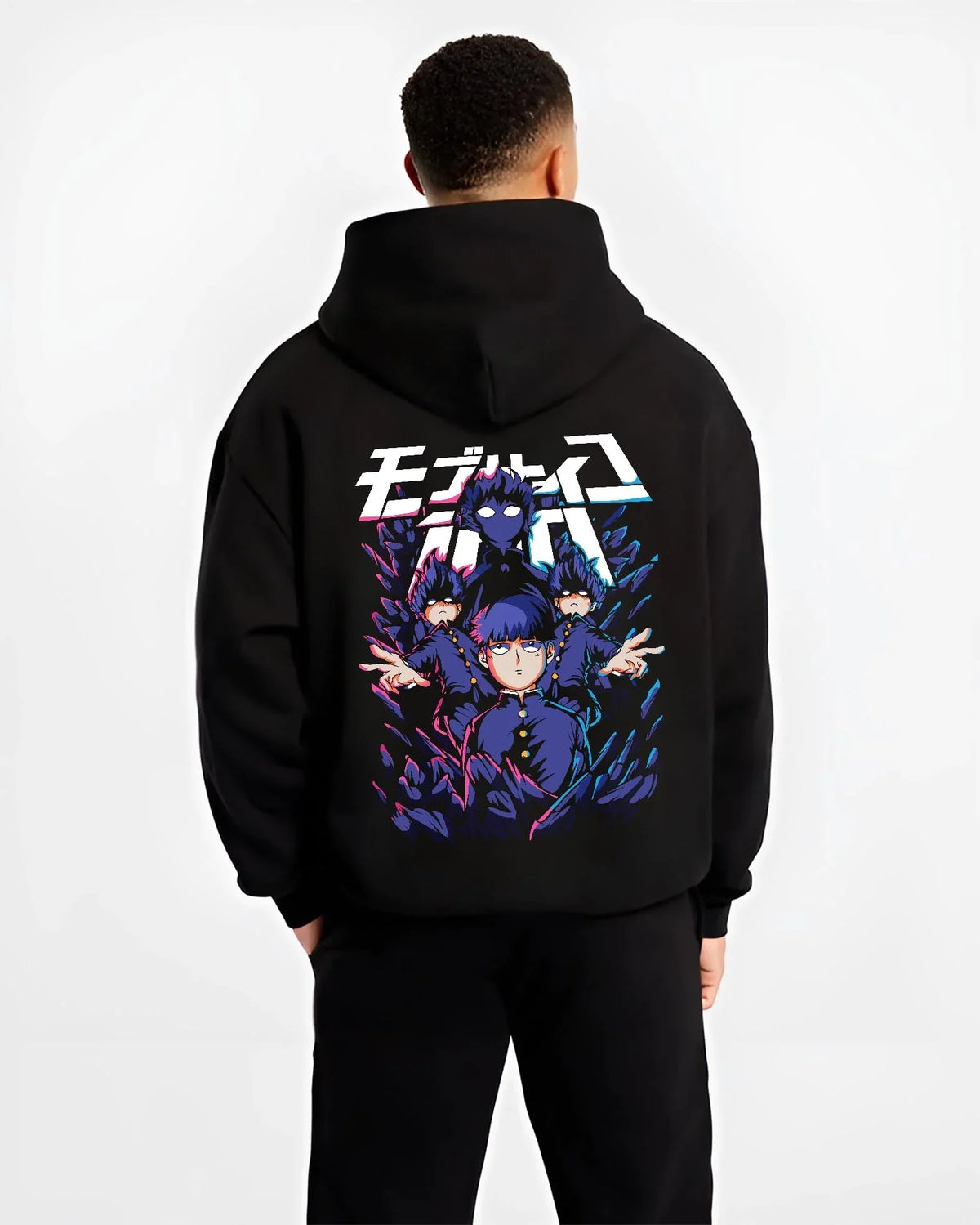 Black hoodie worn by male model, back view with Mob Psycho 100 Hoodie Blue Spirit Energy Jumper graphic bold anime graphic.