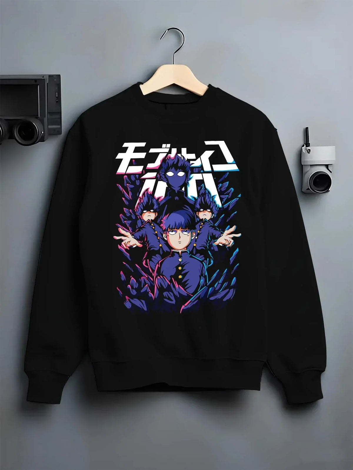 Black crewneck sweatshirt on hanger with Mob Psycho 100 Hoodie Blue Spirit Energy Jumper graphic bold anime graphic.