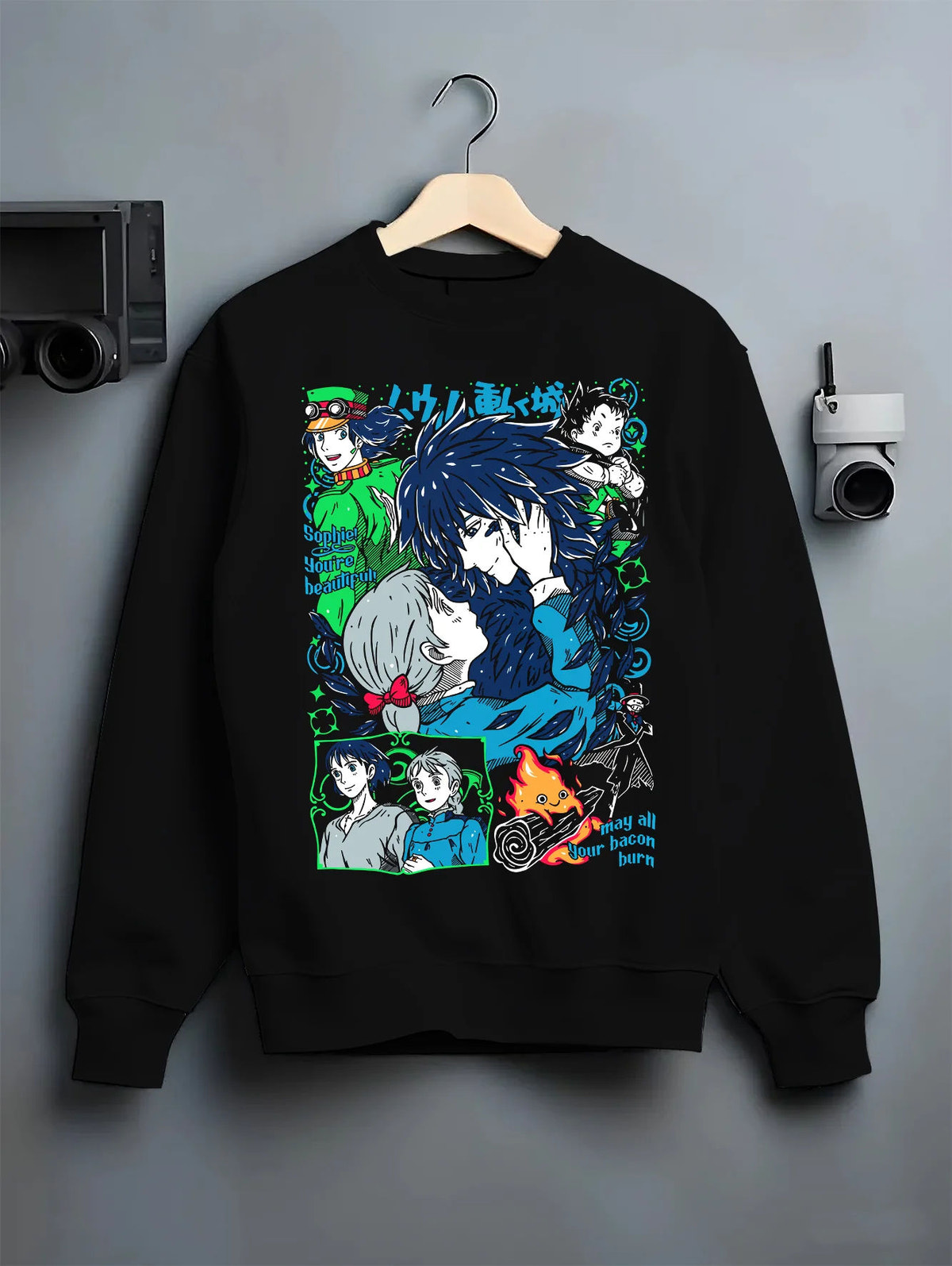 Black crewneck sweatshirt on hanger showing The Boy and the Heron: characters and heron