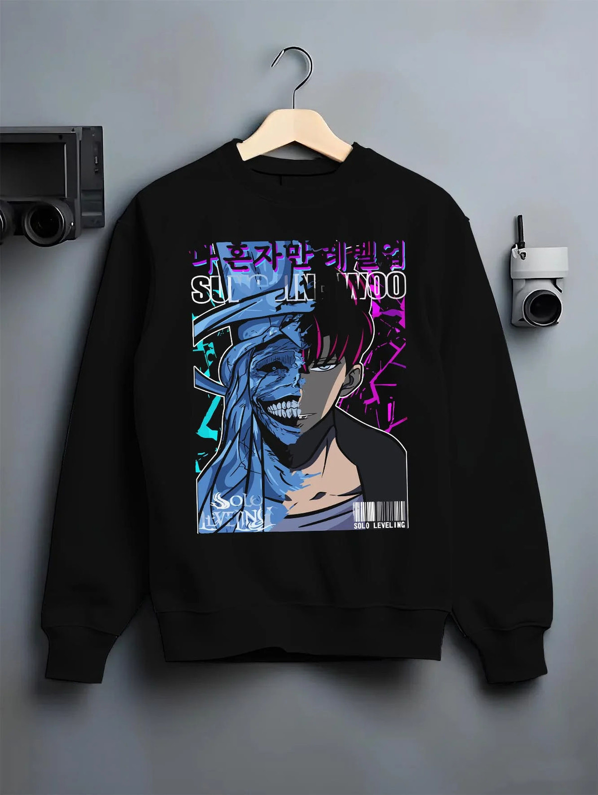 Black crewneck sweatshirt on hanger featuring Sung Jin-Woo Solo Leveling shadow face artwork.