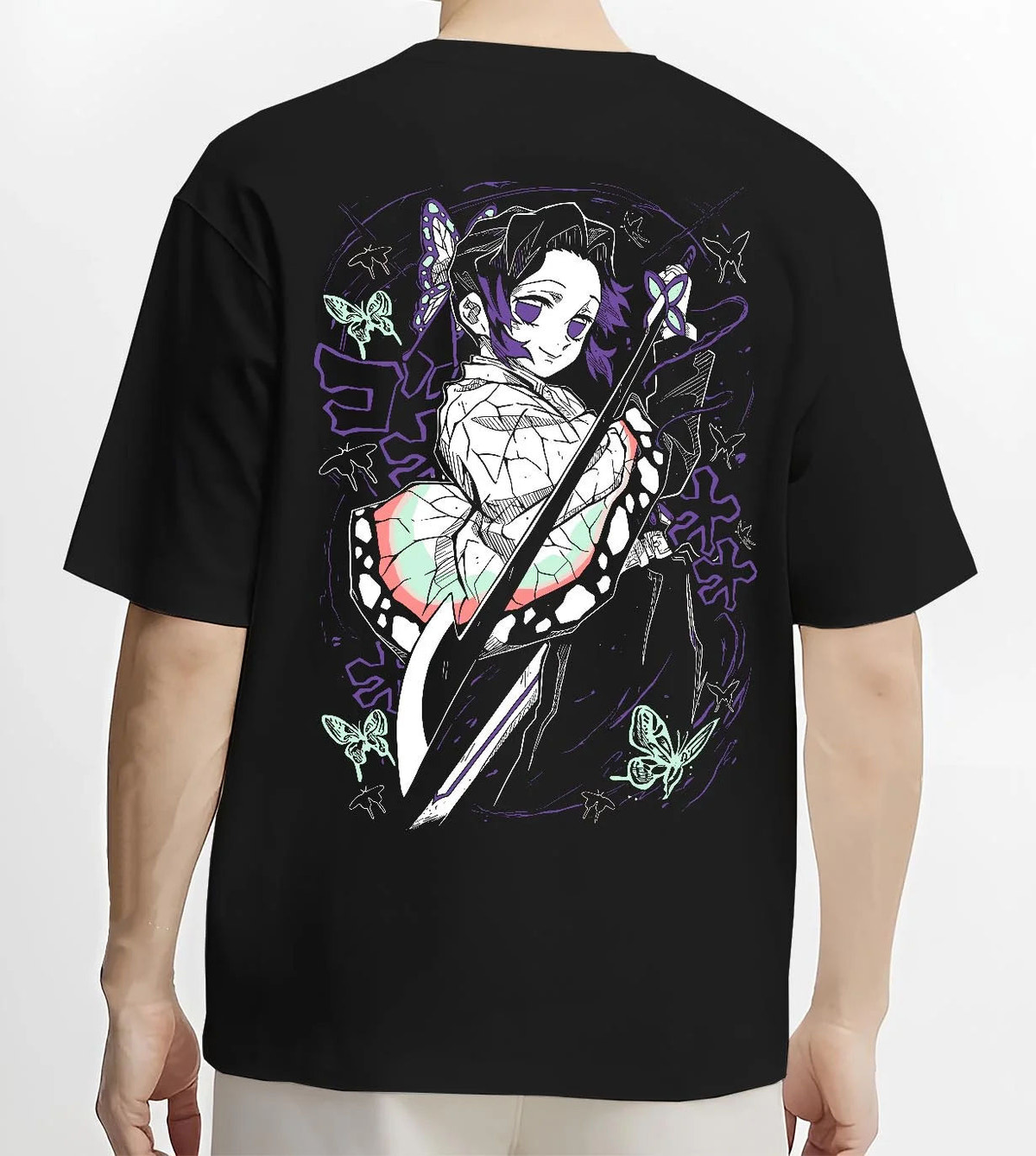 Black T-shirt worn by male model from the back featuring Shinobu Kocho Butterfly Dance Demon Slayer artwork.