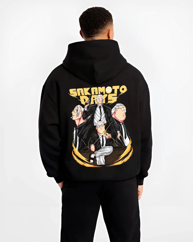 Black hoodie worn by male model from the back featuring Taro Sakamoto Sakamoto Days action artwork.