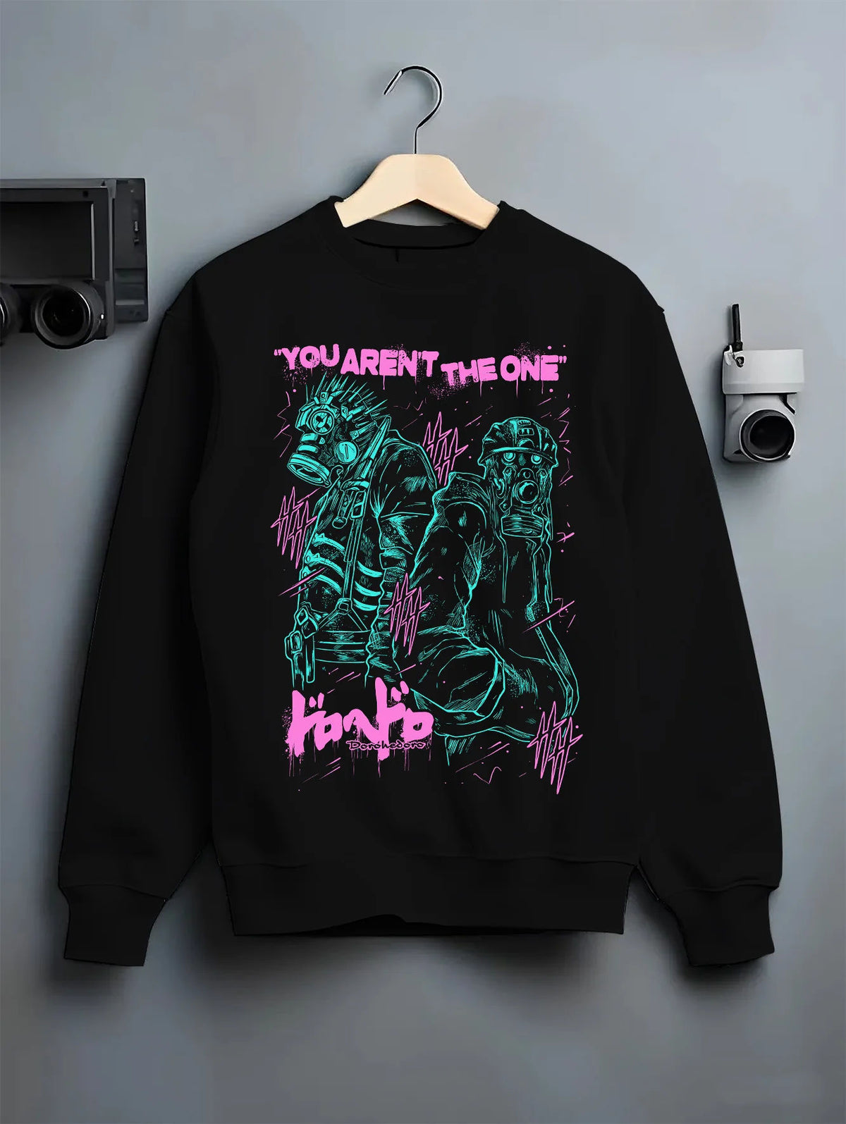 Black crewneck sweatshirt on hanger showing Caiman and Nikaido from Dorohedoro: dark fantasy illustration