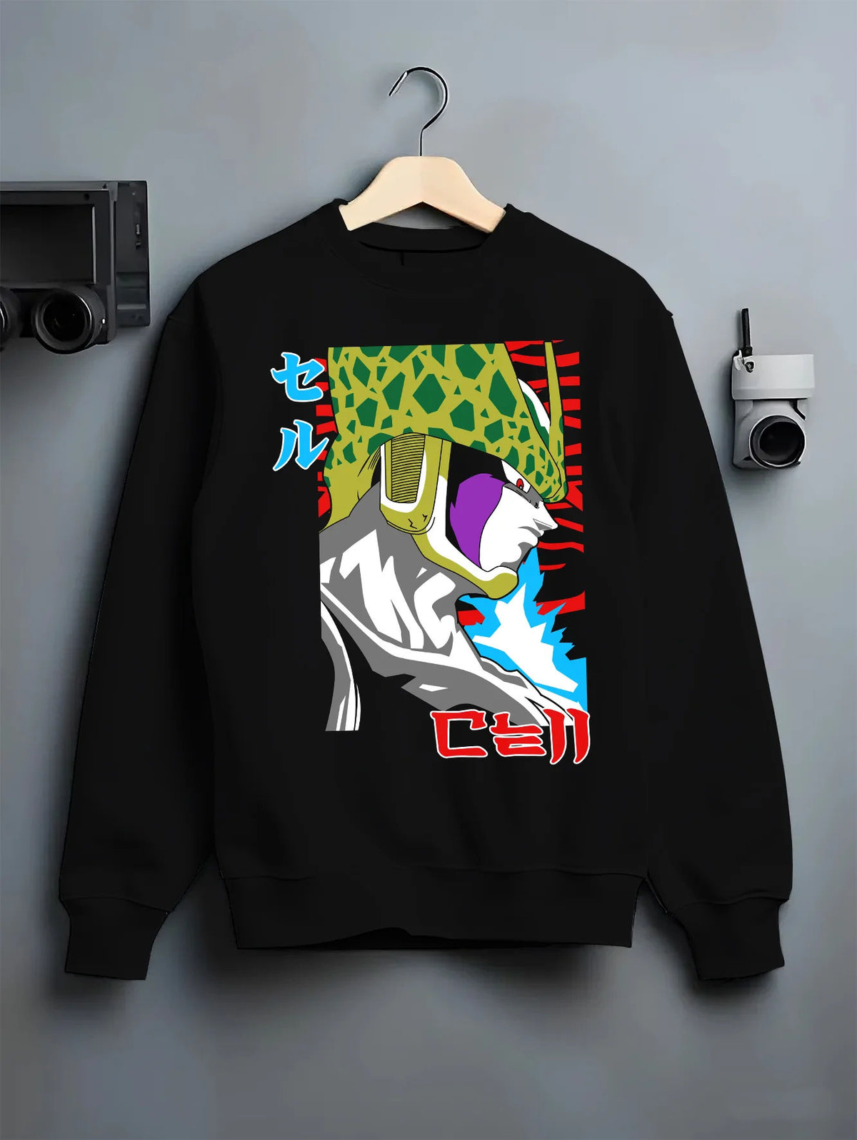 Black crewneck sweatshirt on hanger showing Cell from Dragon Ball: Perfect Cell form