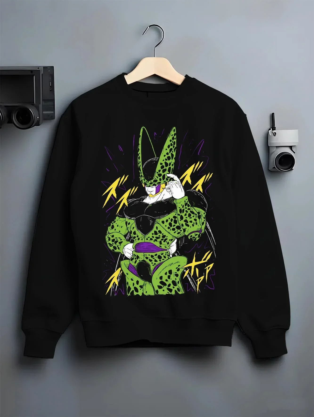 Black crewneck sweatshirt on hanger with Cell Second Form Hoodie Dragon Ball Z Villain Stance graphic bold anime graphic.