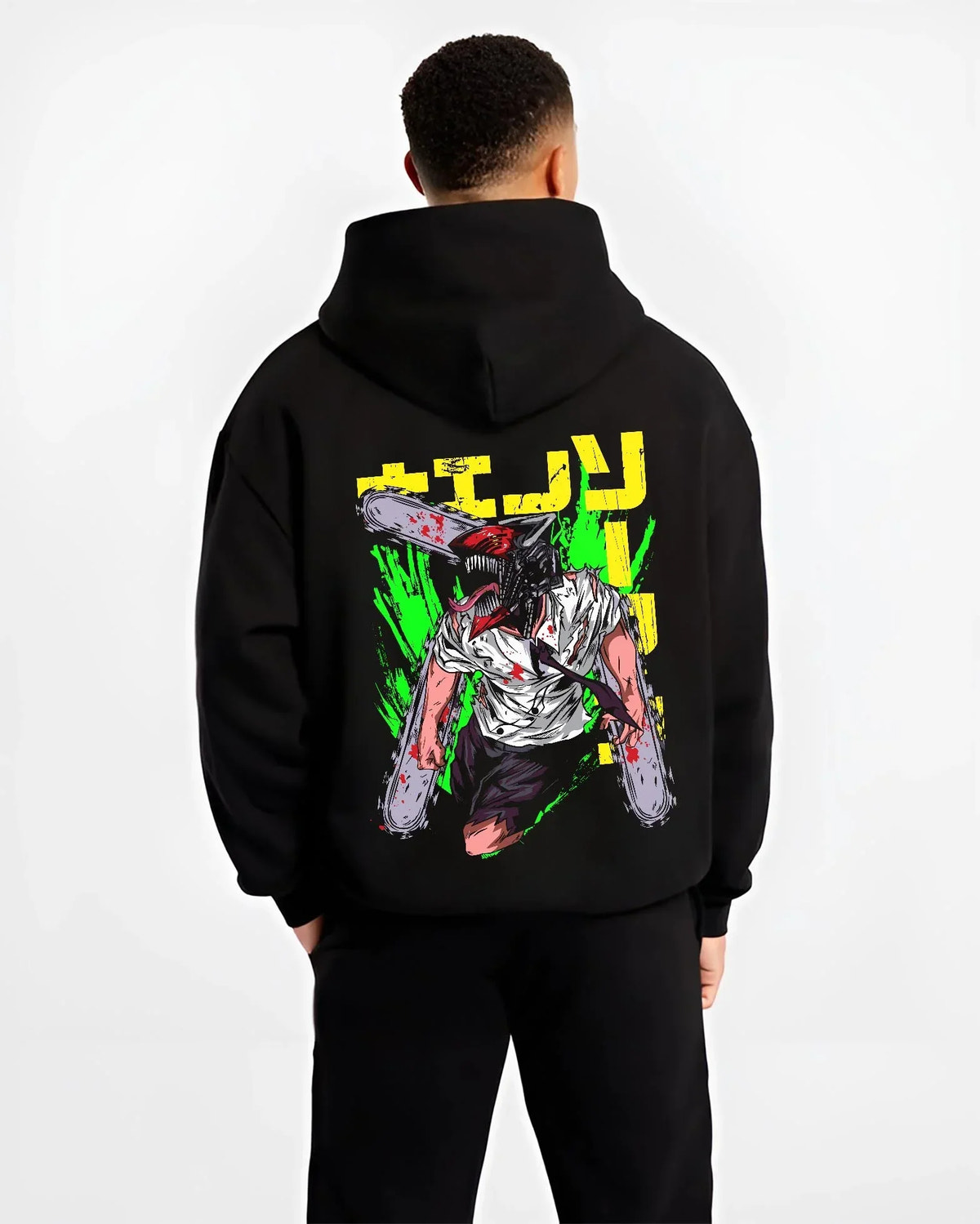 Black hoodie worn by male model, back view with Chainsaw Man Hoodie Denji Devil Hunter Green Slash graphic premium wear.