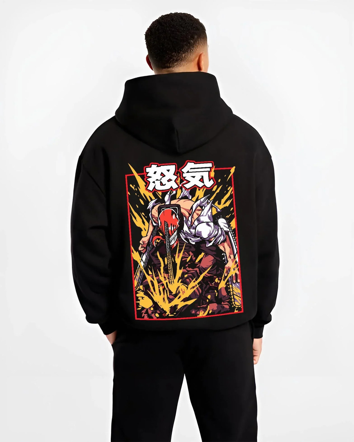 Black hoodie worn by male model, back view with Chainsaw Man Hoodie Denji Devil Hunter Rage Flames graphic premium wear.
